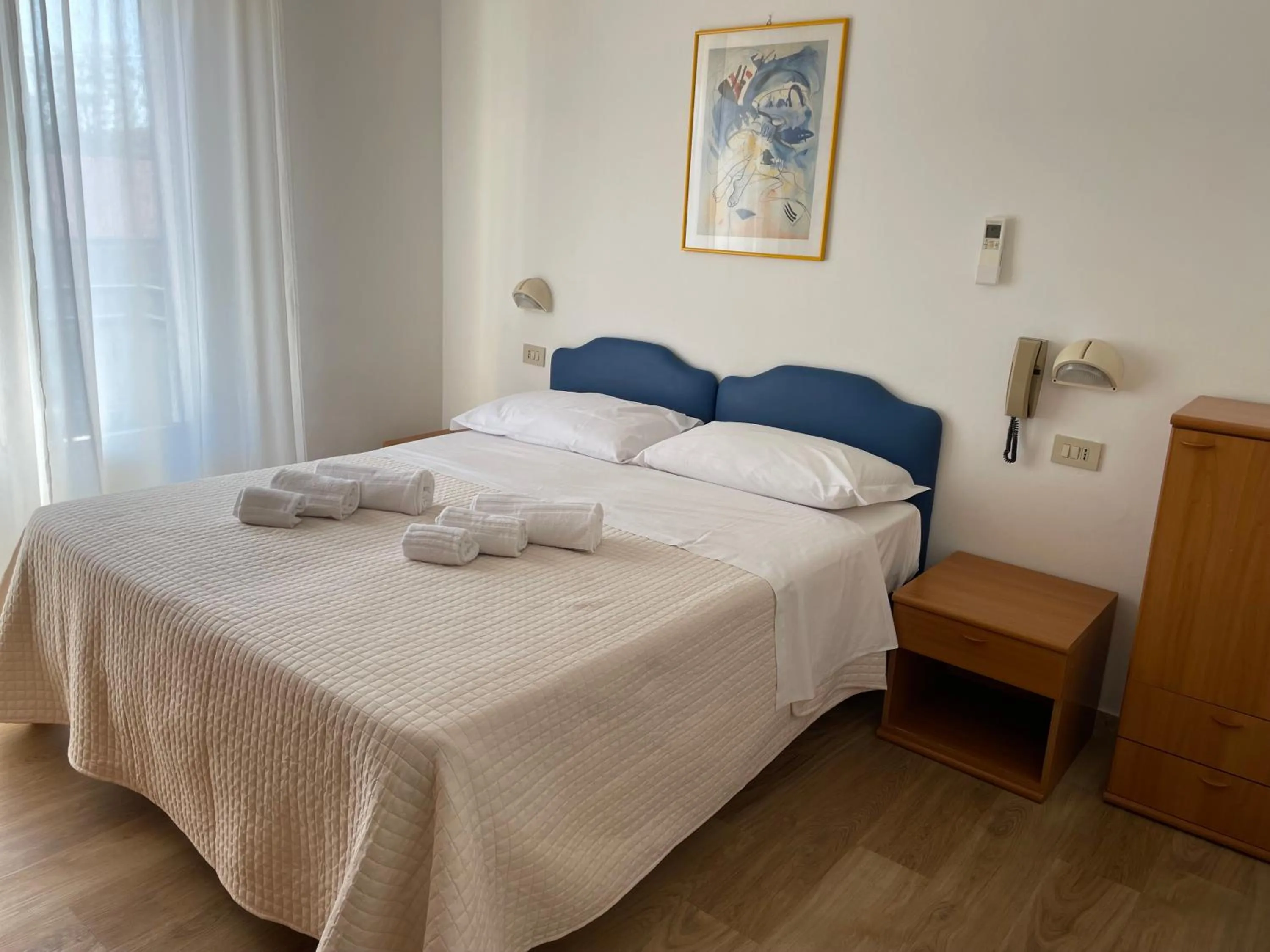 Bed in Hotel Barbiani