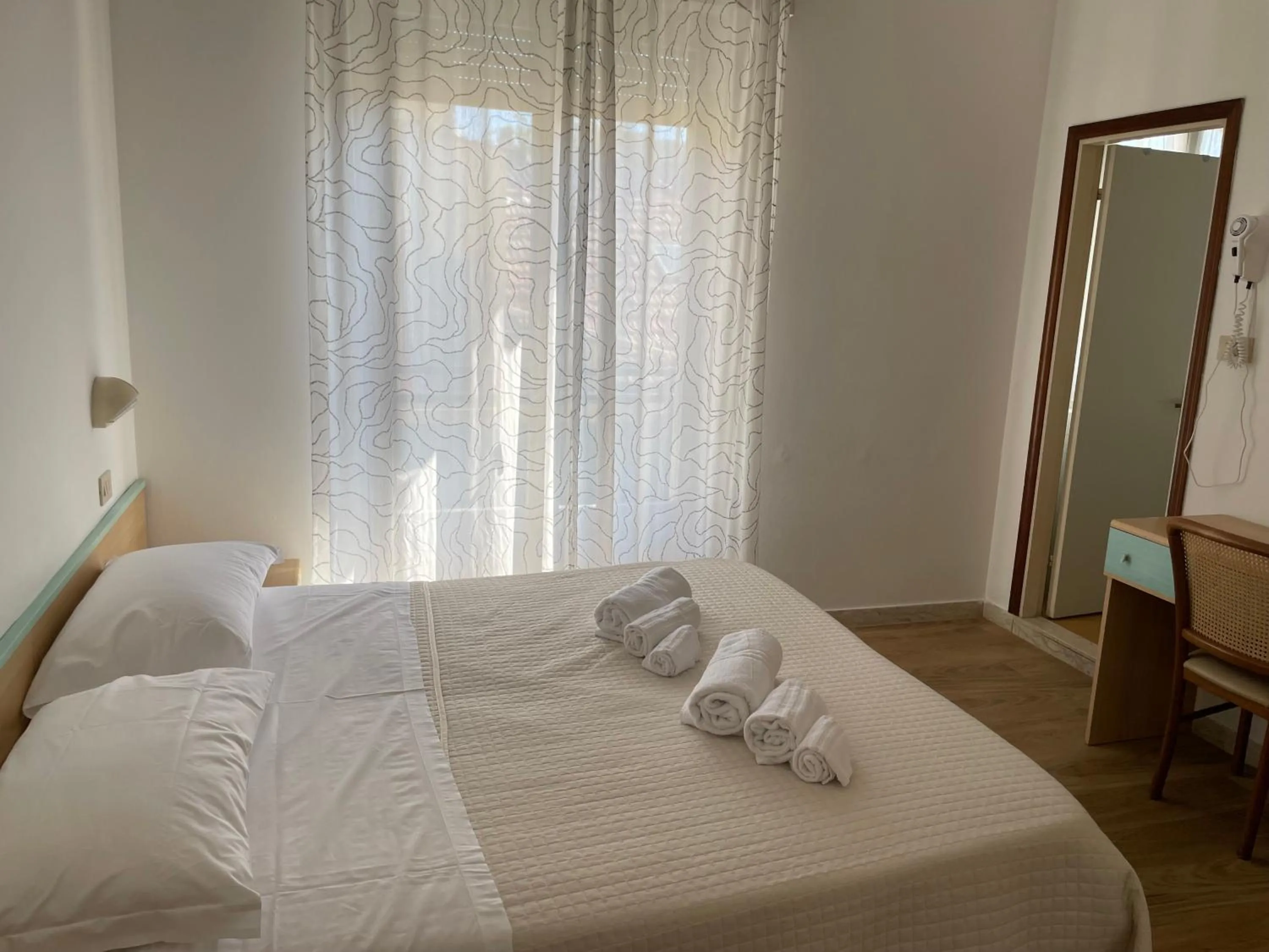 Bed in Hotel Barbiani