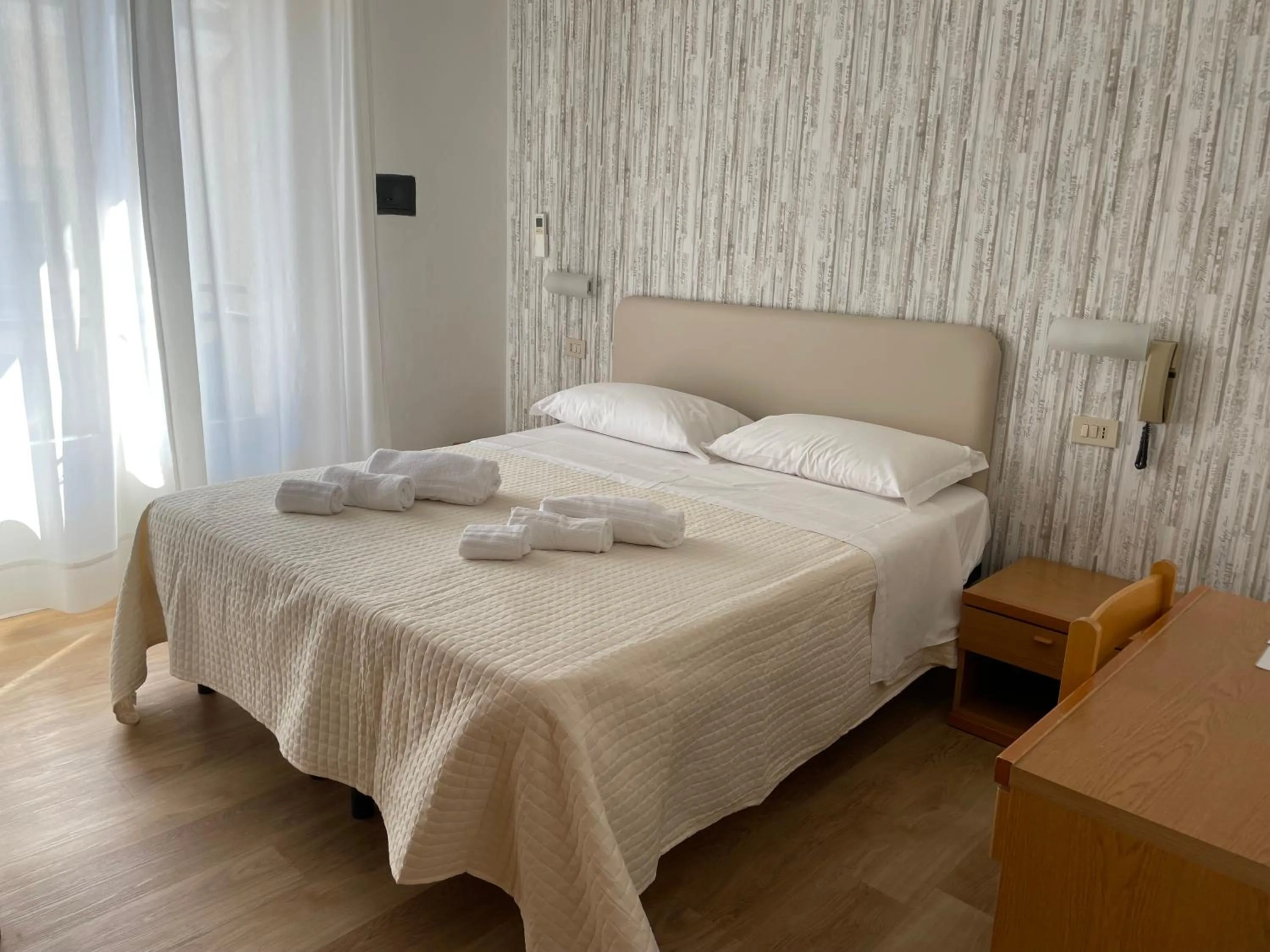 Bed in Hotel Barbiani