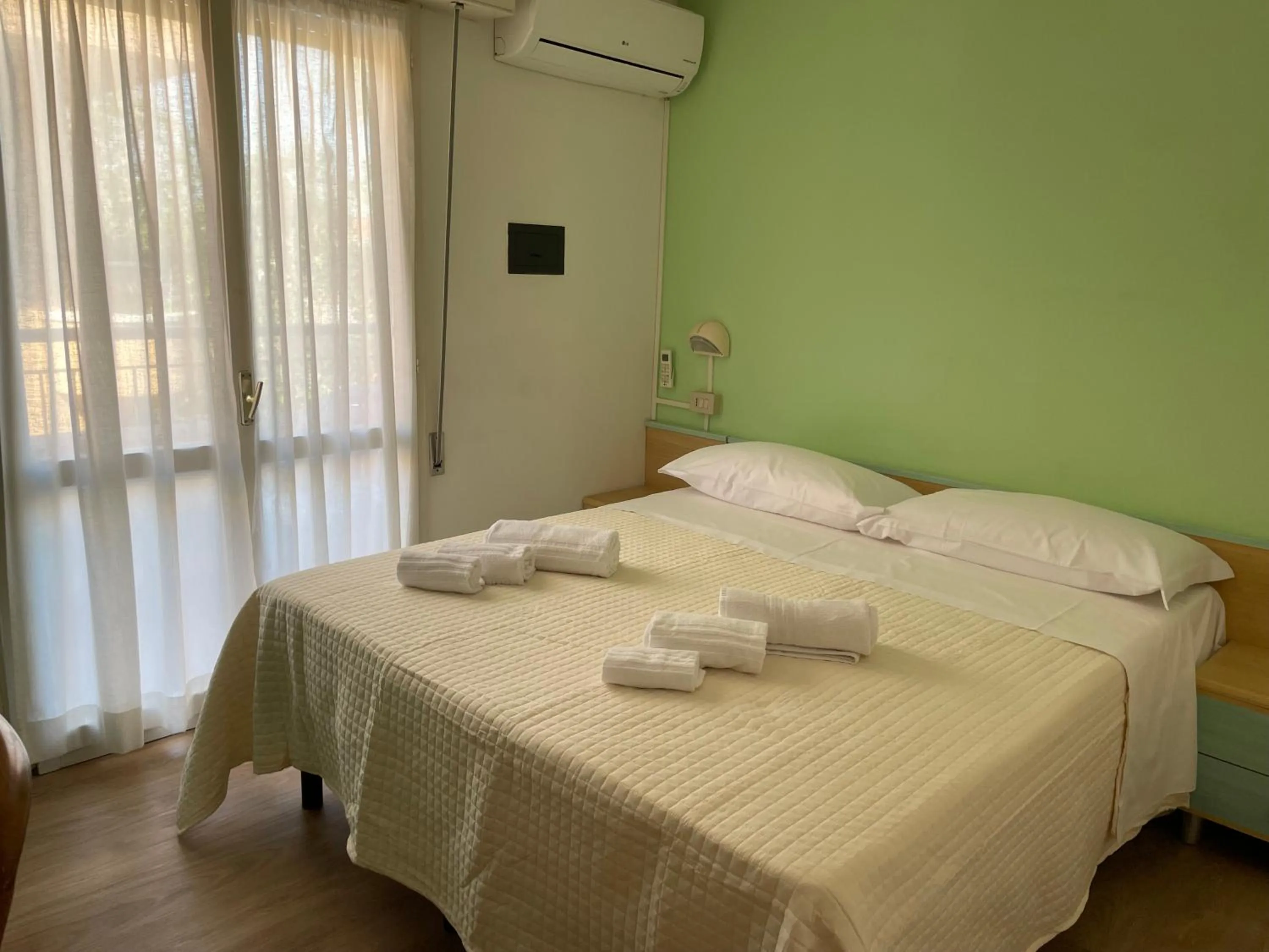 Bed in Hotel Barbiani