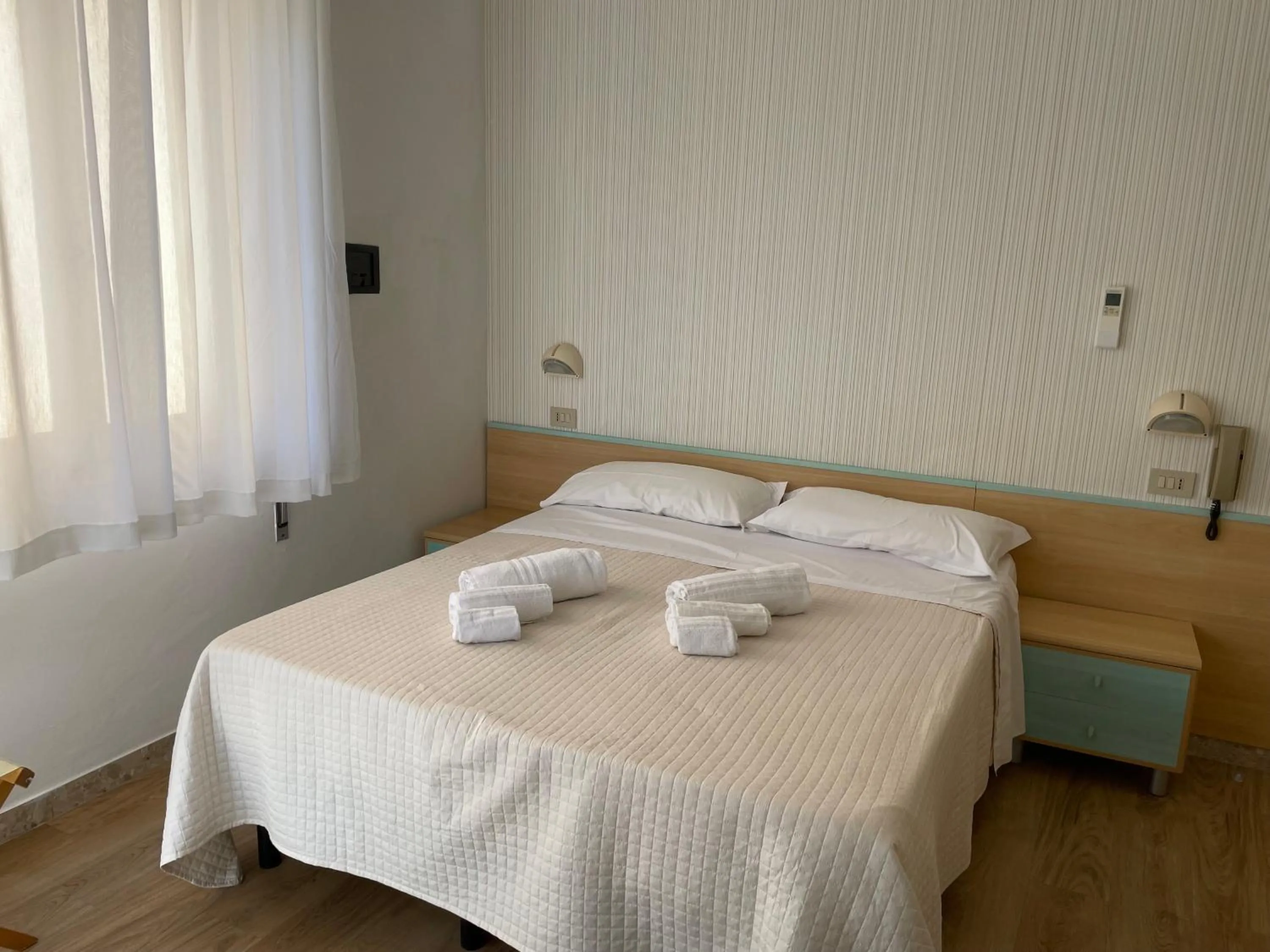 Bed in Hotel Barbiani