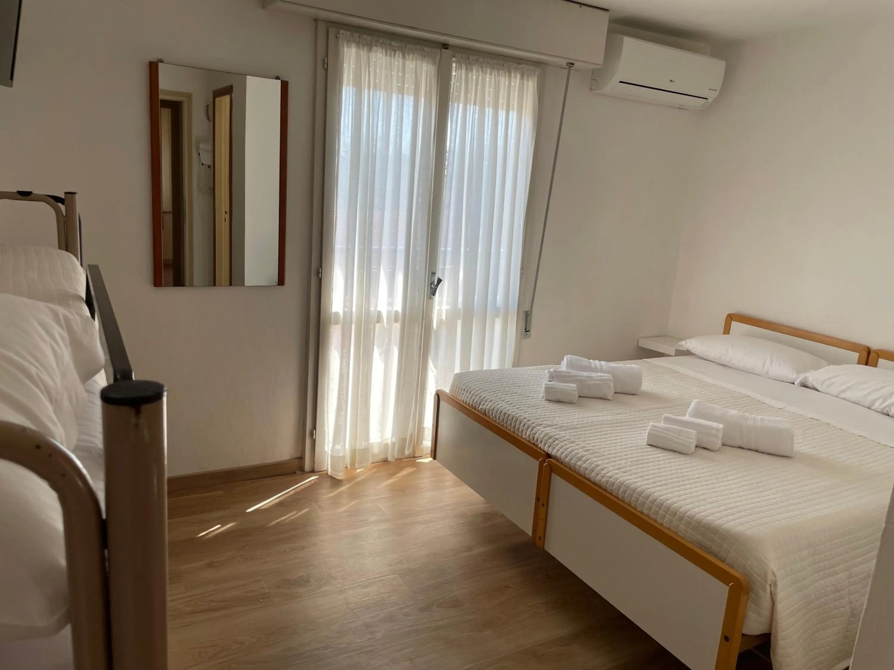 Bed in Hotel Barbiani