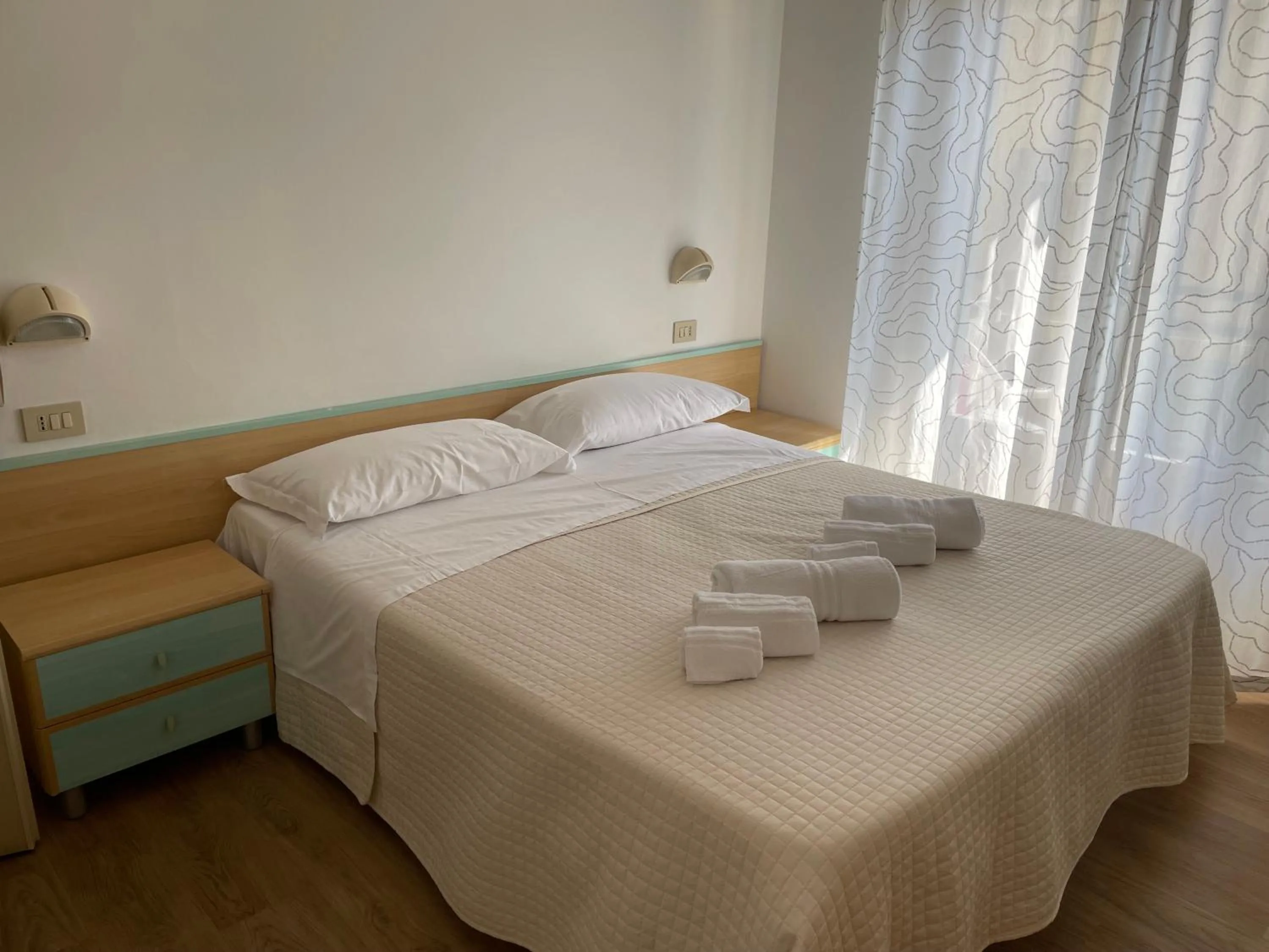 Bed in Hotel Barbiani