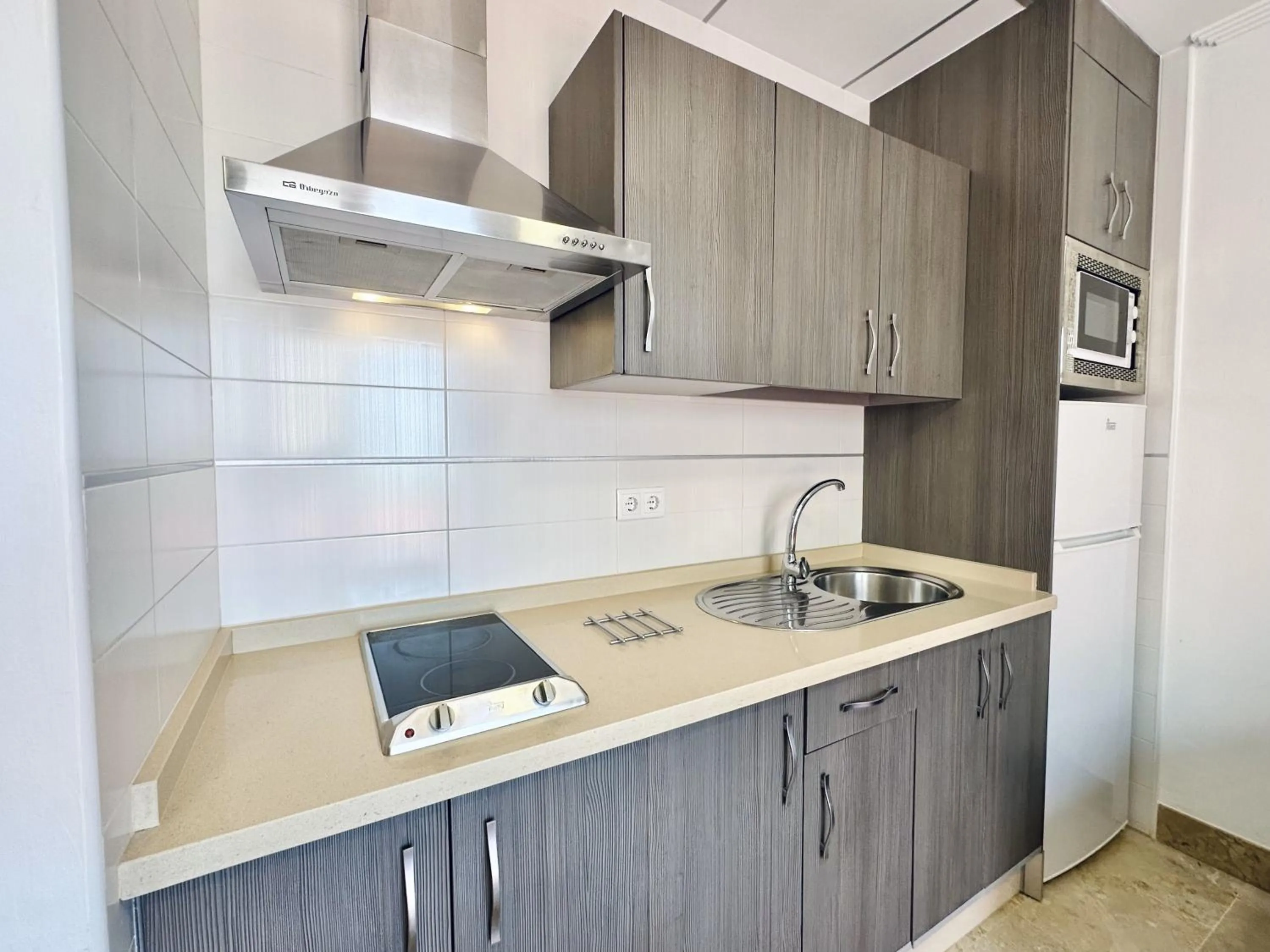 Kitchen or kitchenette in Hotel Apartamentos Marina Luz