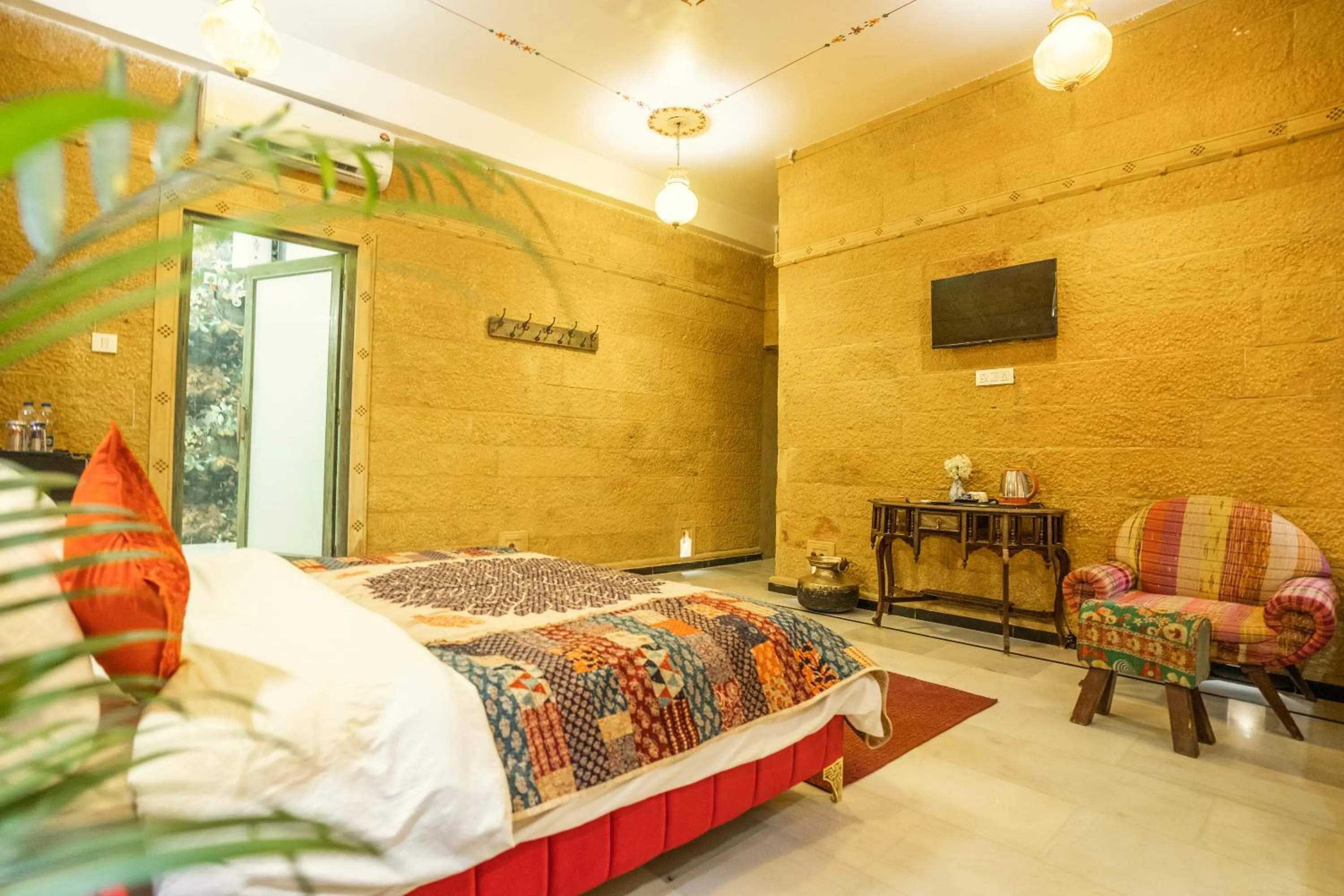 Seating area, Bed in Garh Meera - A Sensational Boutique Hotel
