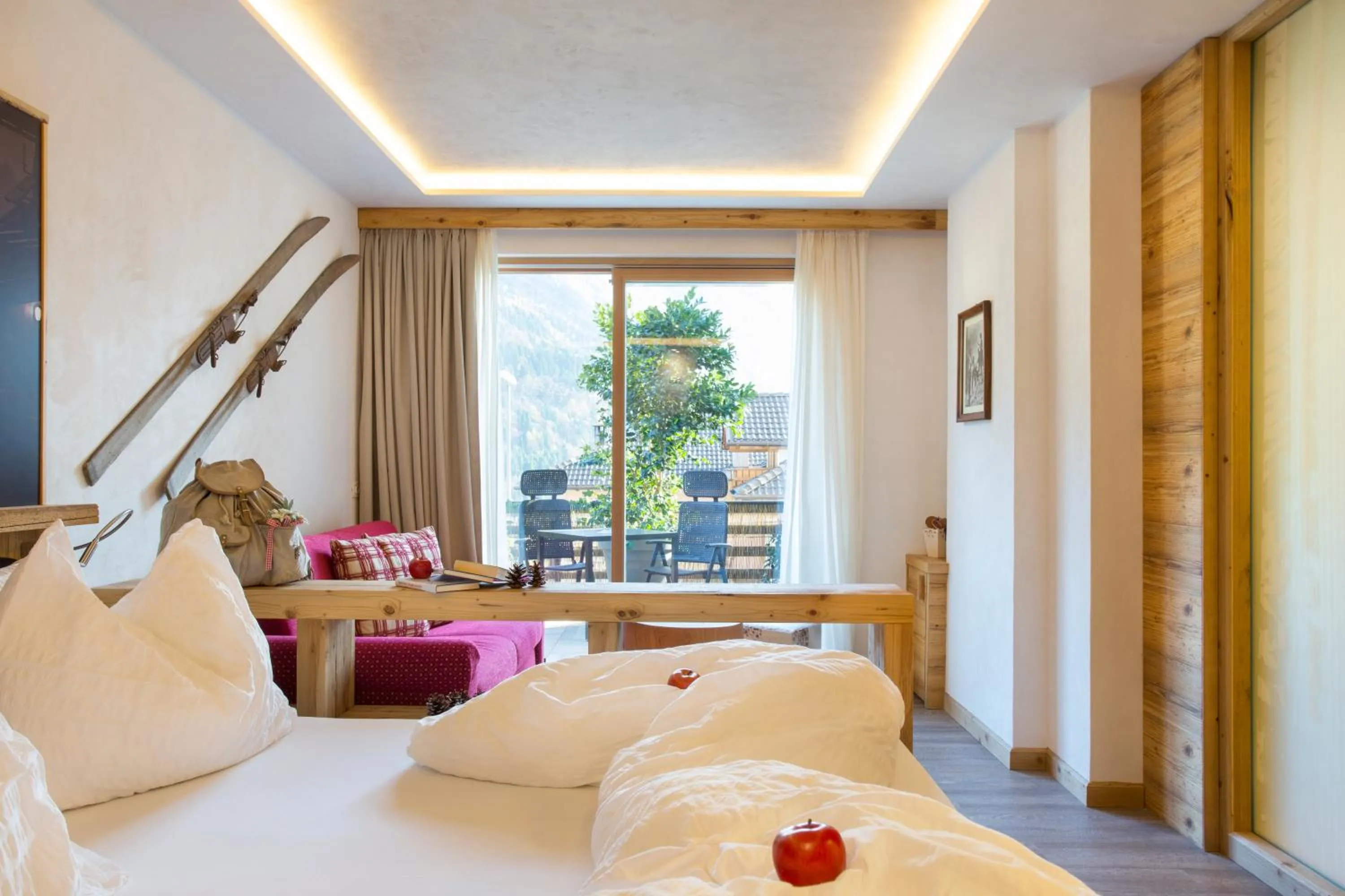 Bed in Alpotel Dolomiten