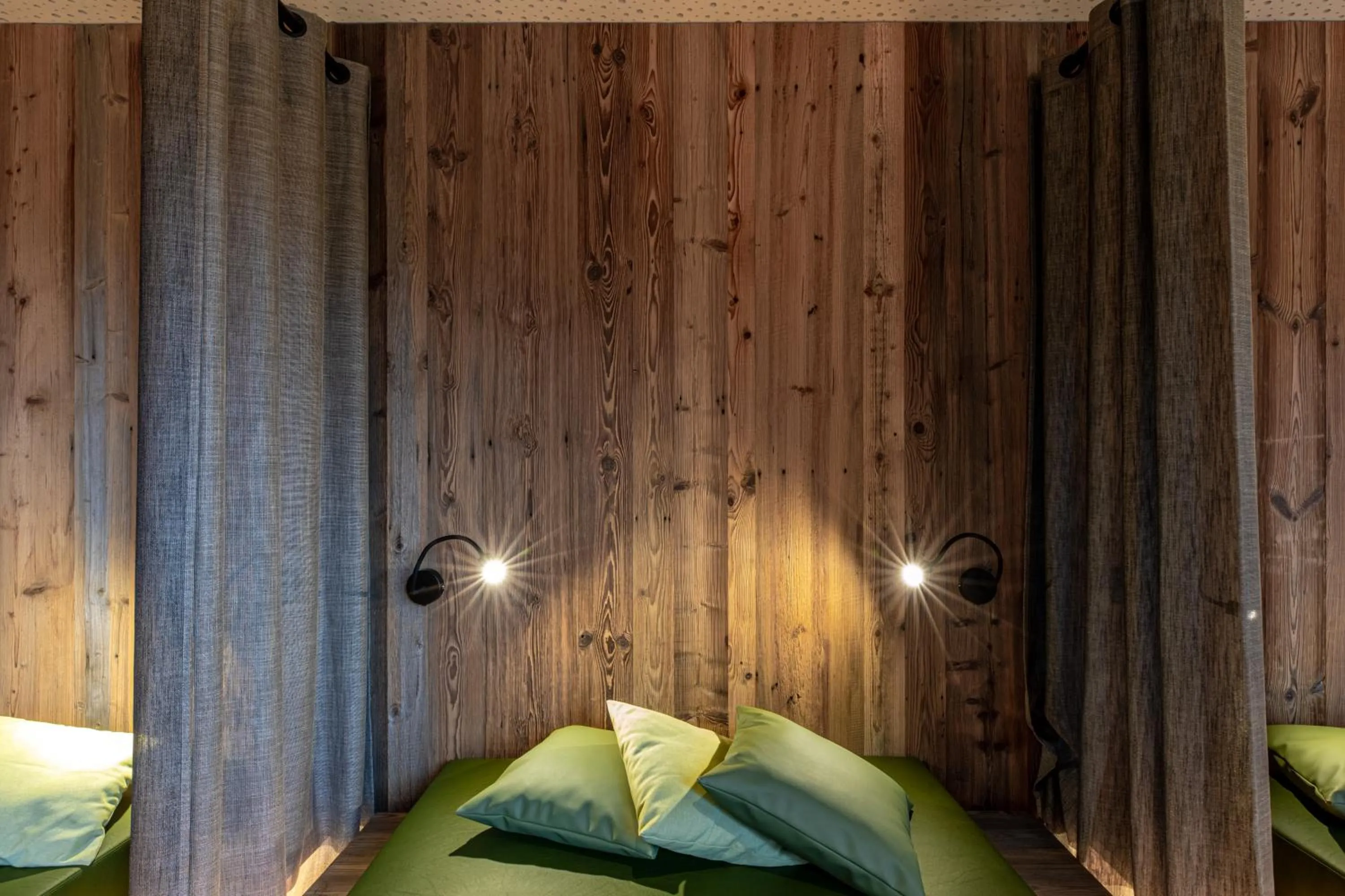 Bed in Alpotel Dolomiten
