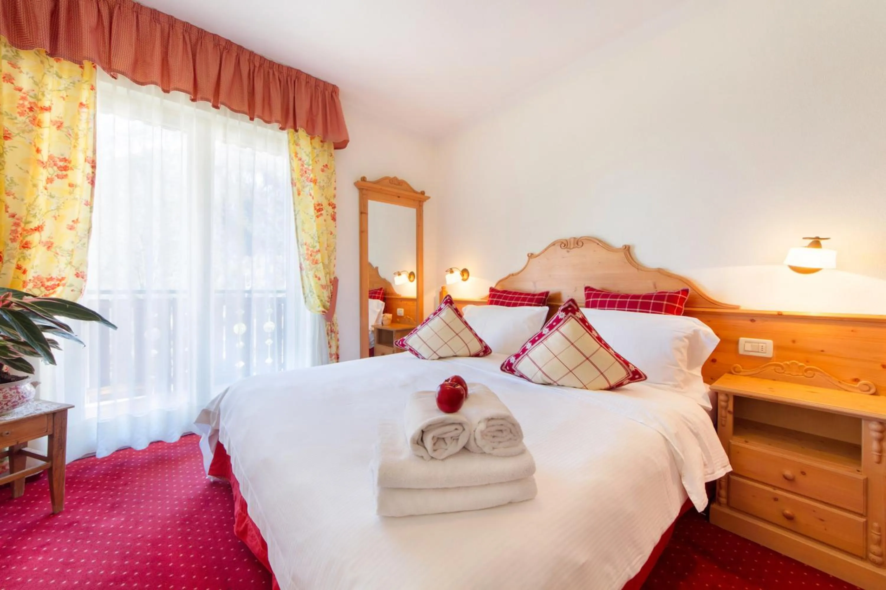 Bed in Alpotel Dolomiten