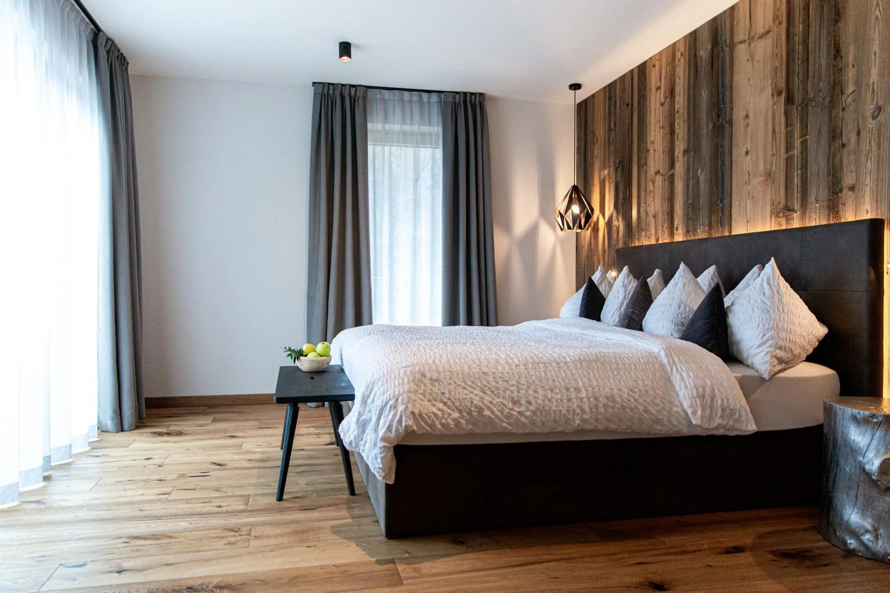 Bed in Alpotel Dolomiten