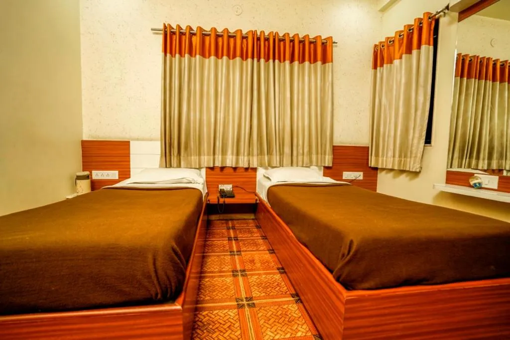 Bed in Hotel Bhakti Rajkot I Hotel in Rajkot I Best Hotel in Rajkot