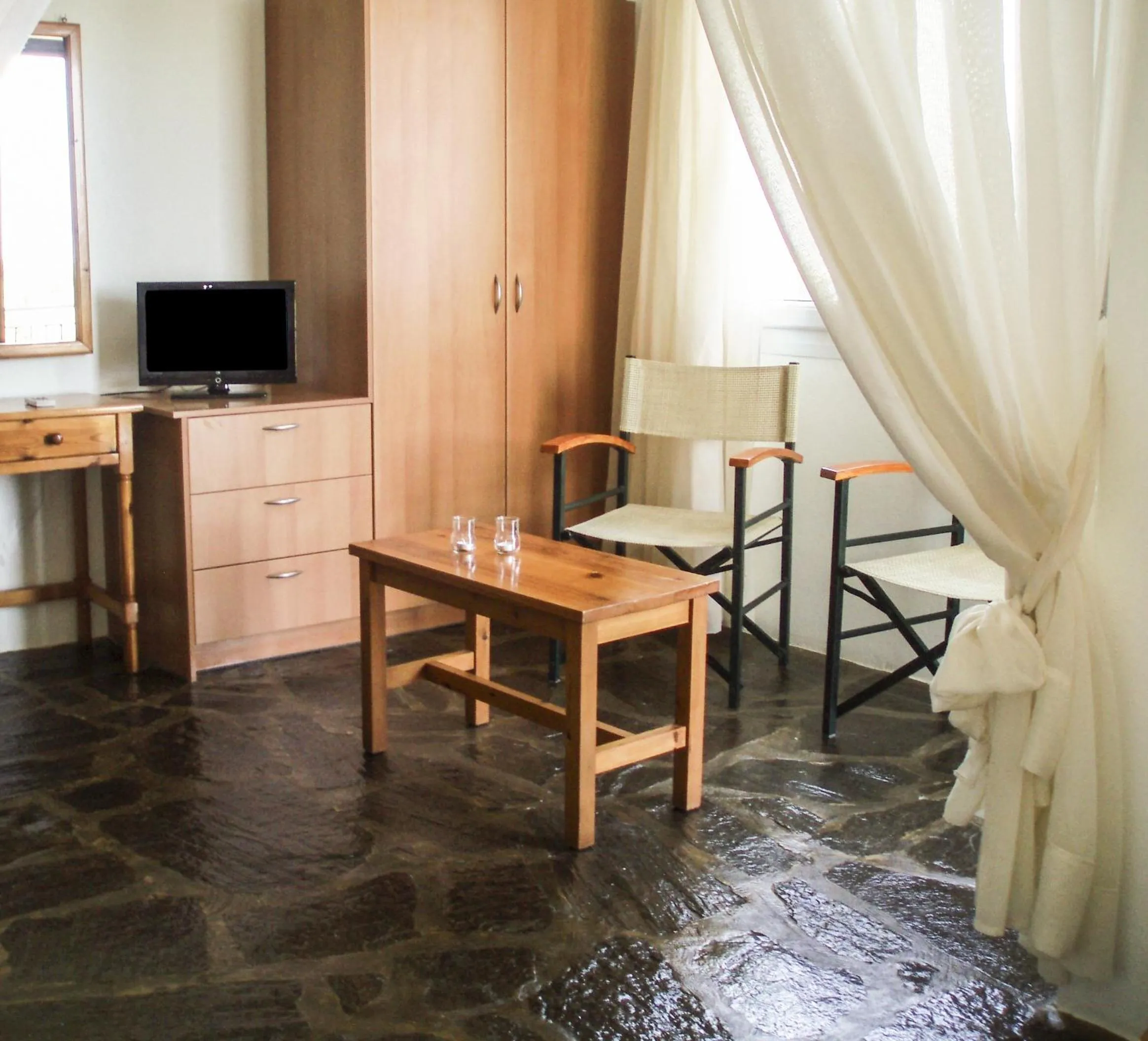 Seating area in Scorpios Hotel & Suites