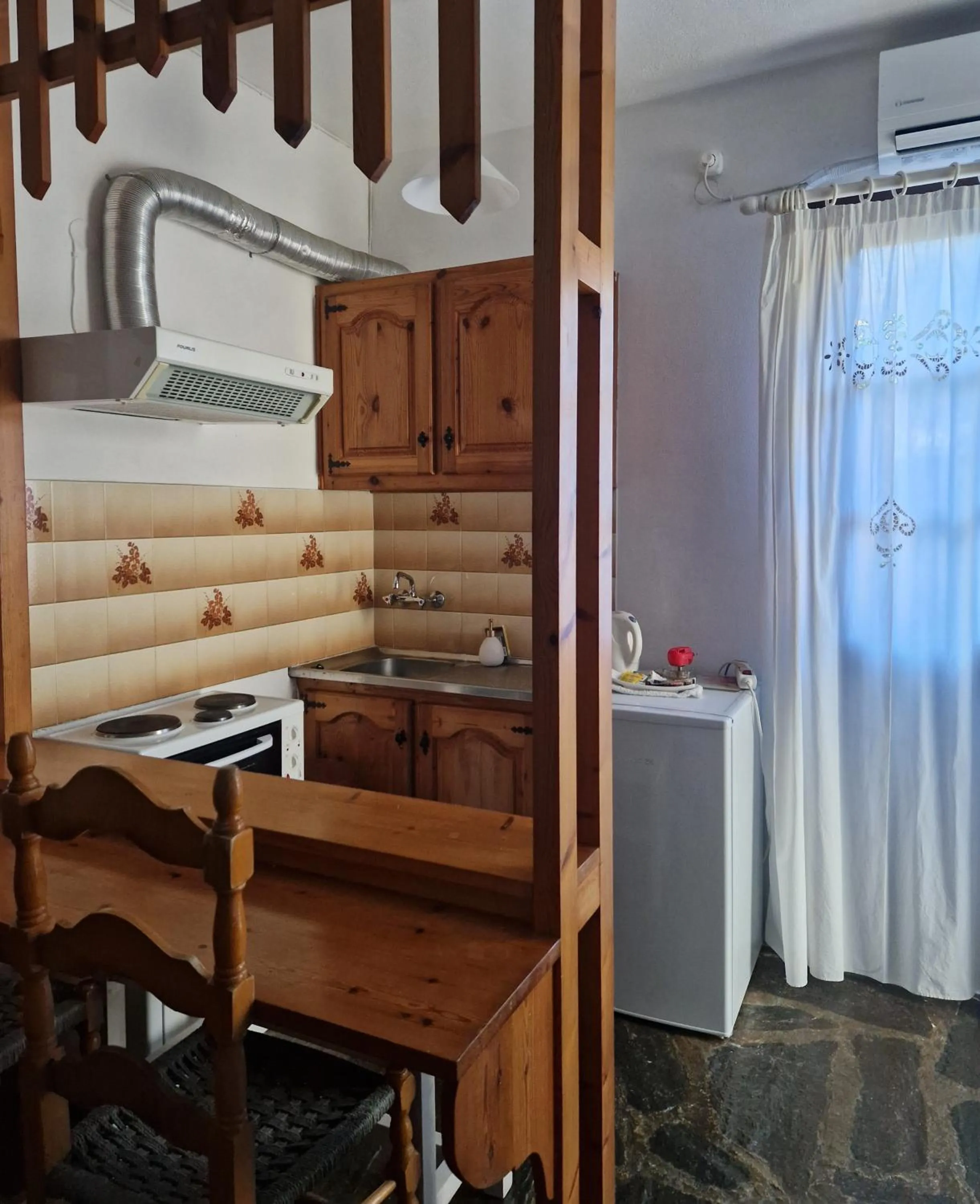 Kitchen or kitchenette in Scorpios Hotel & Suites