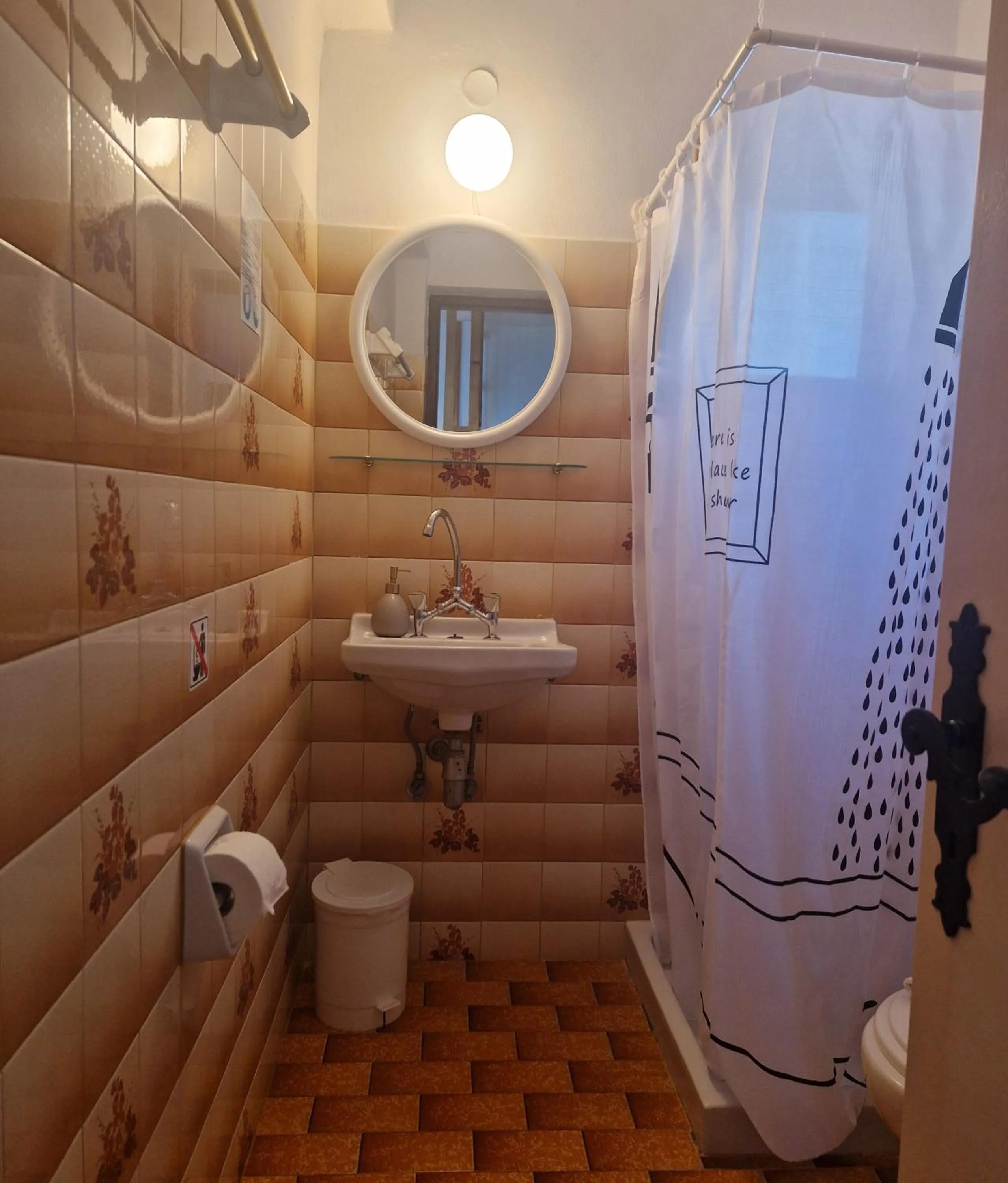 Bathroom in Scorpios Hotel & Suites