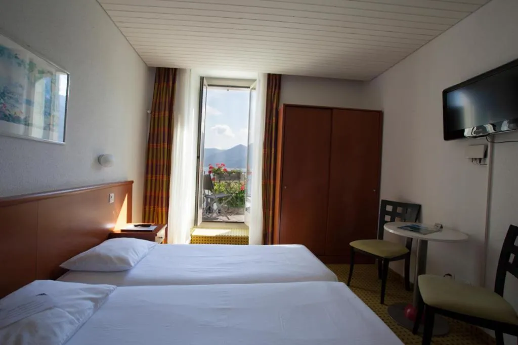 Photo of the whole room, Bed in Piazza Ascona Hotel & Restaurants