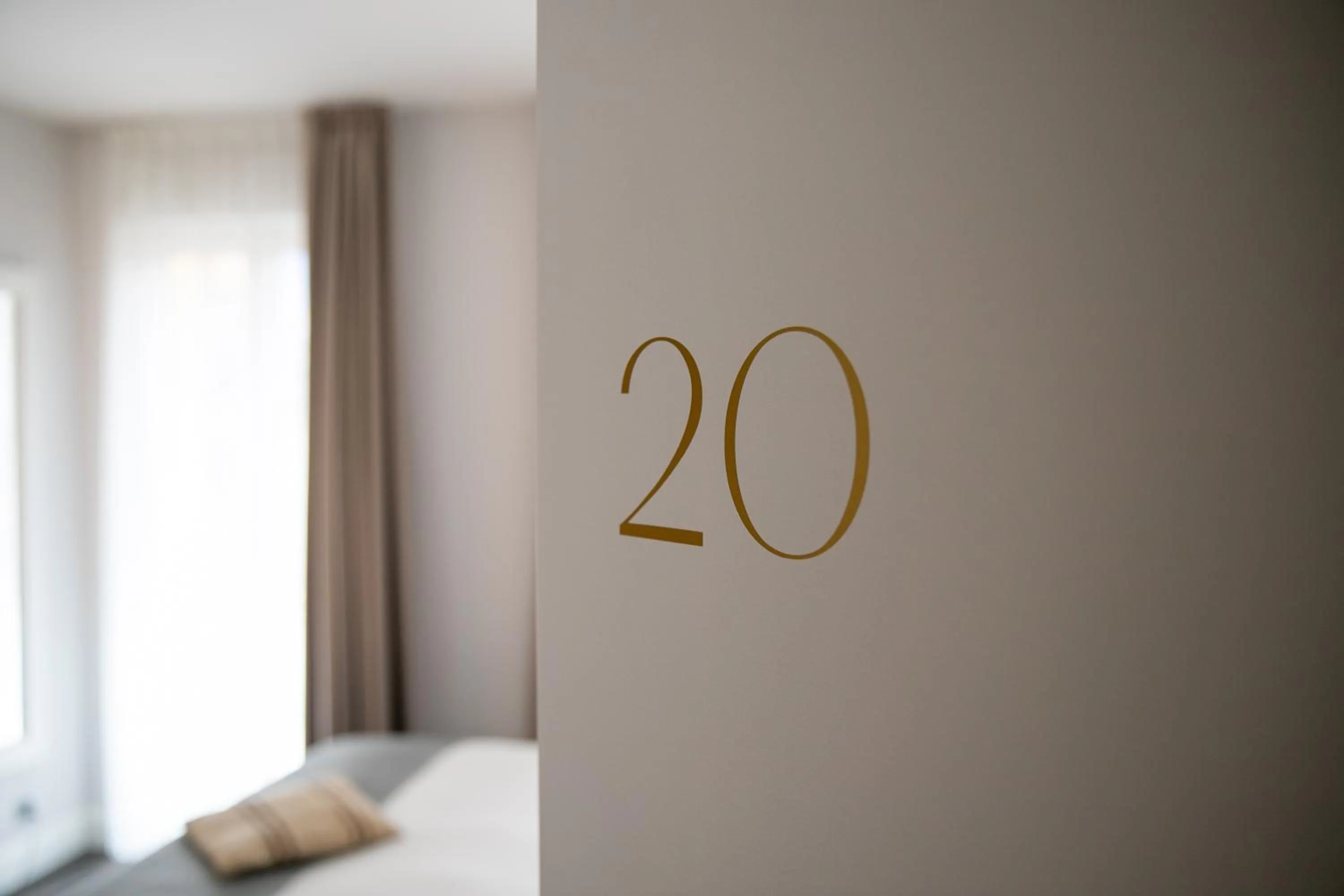 Text overlay, Bed in Vista Lakefront Boutique Hotel