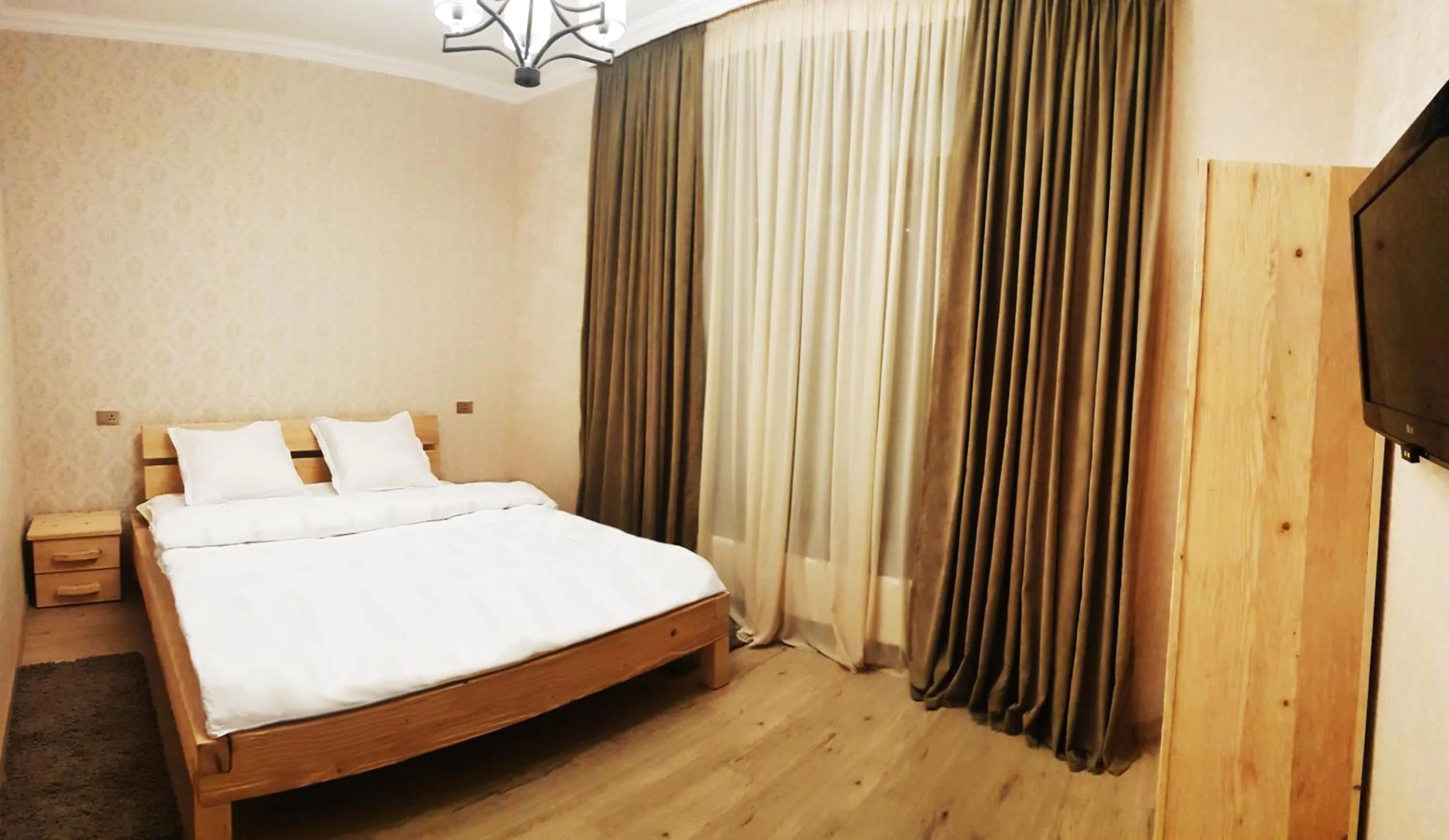 Bed in Cozy Hotel Kazbegi