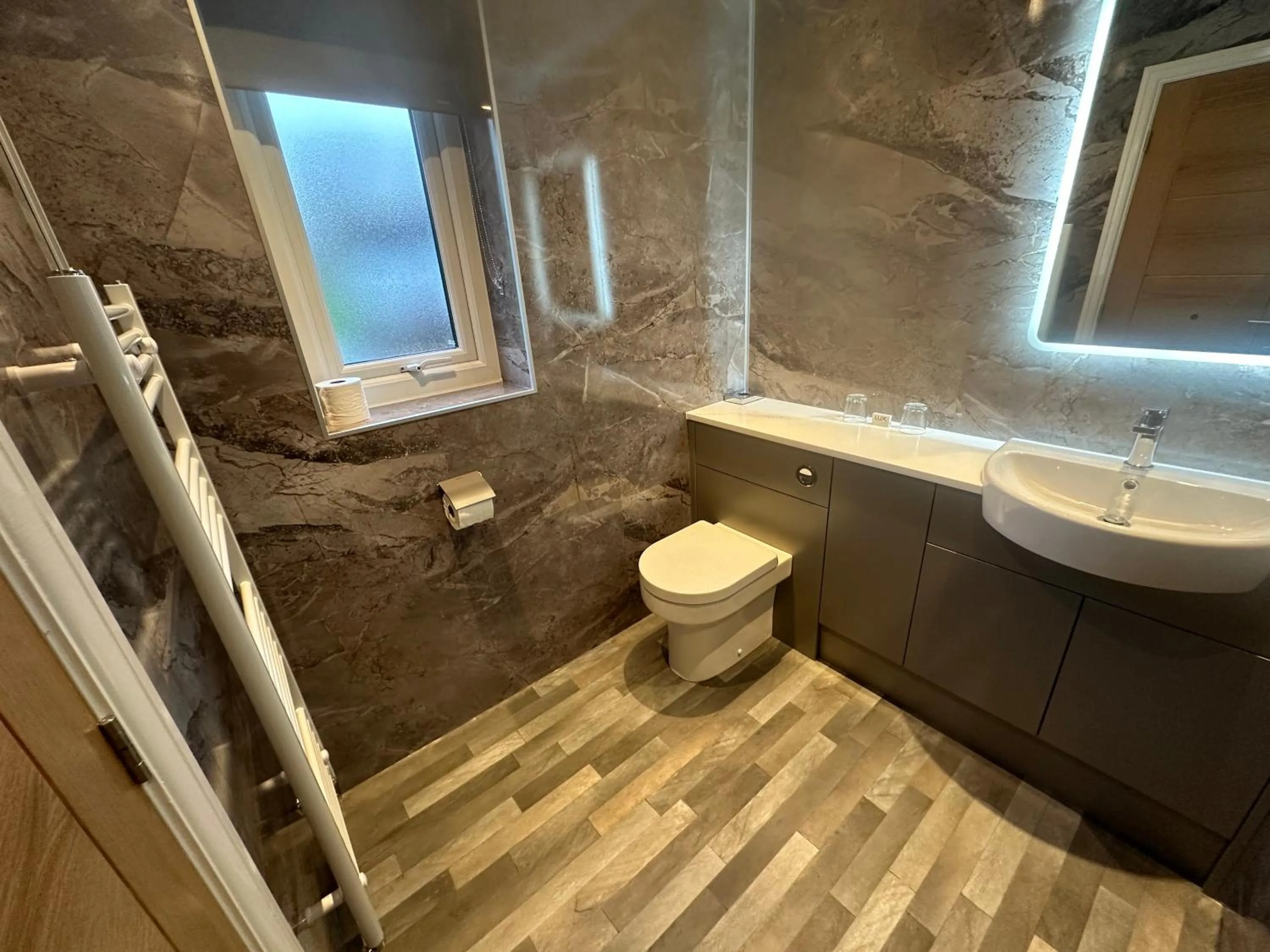 Toilet in Burton Lodge Guest House & Spa