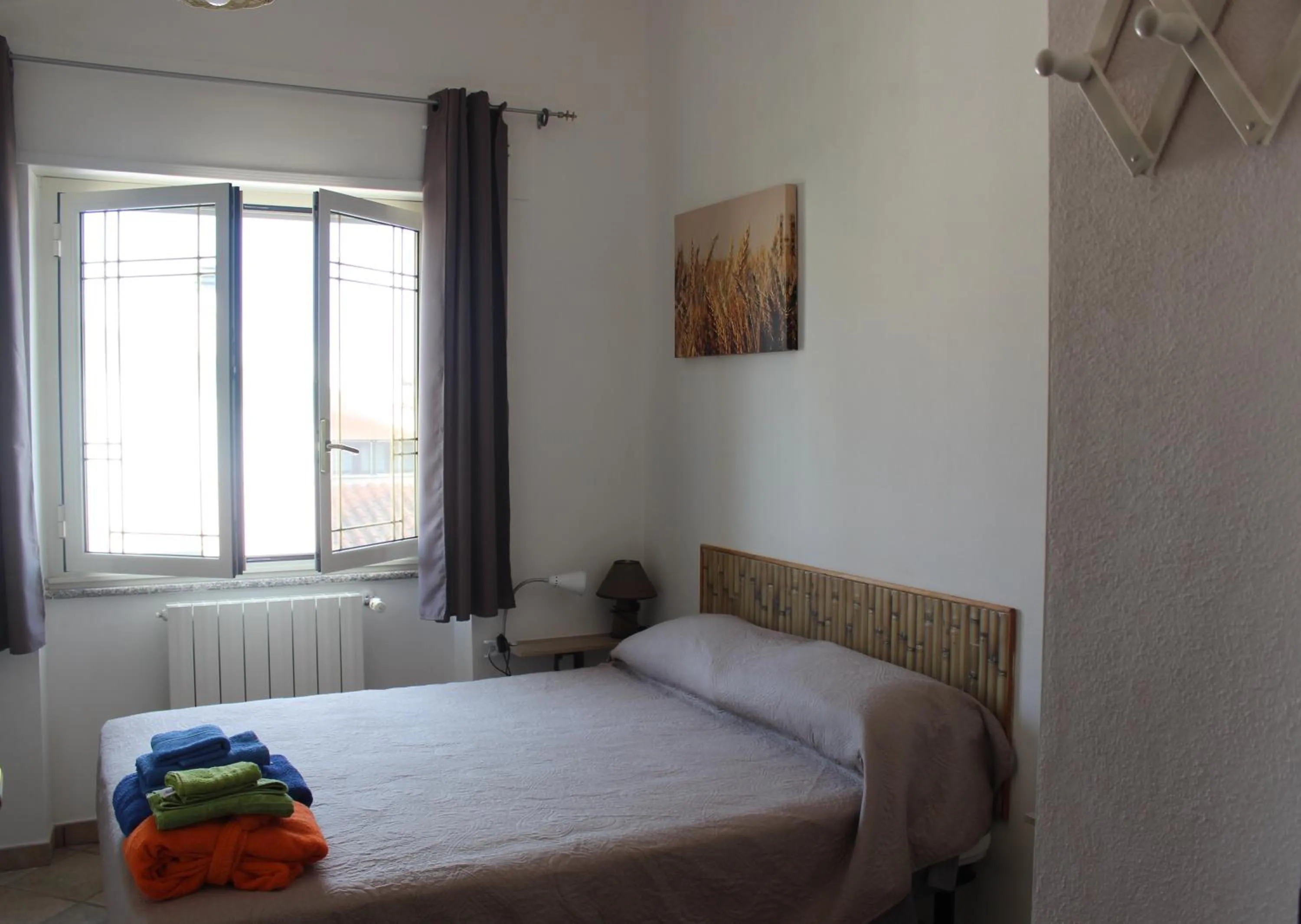 Photo of the whole room, Bed in B&B S'arenada