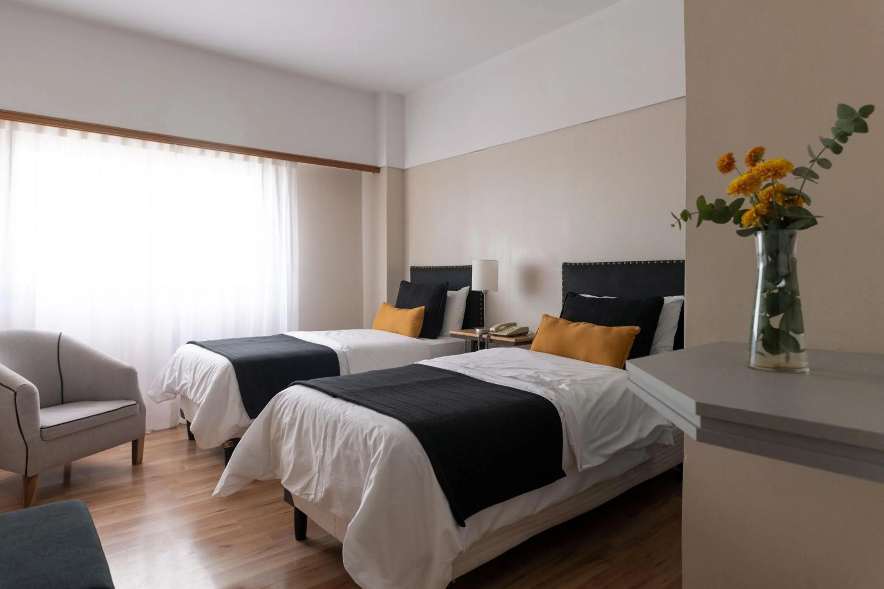 Photo of the whole room, Bed in Aguada Hotel