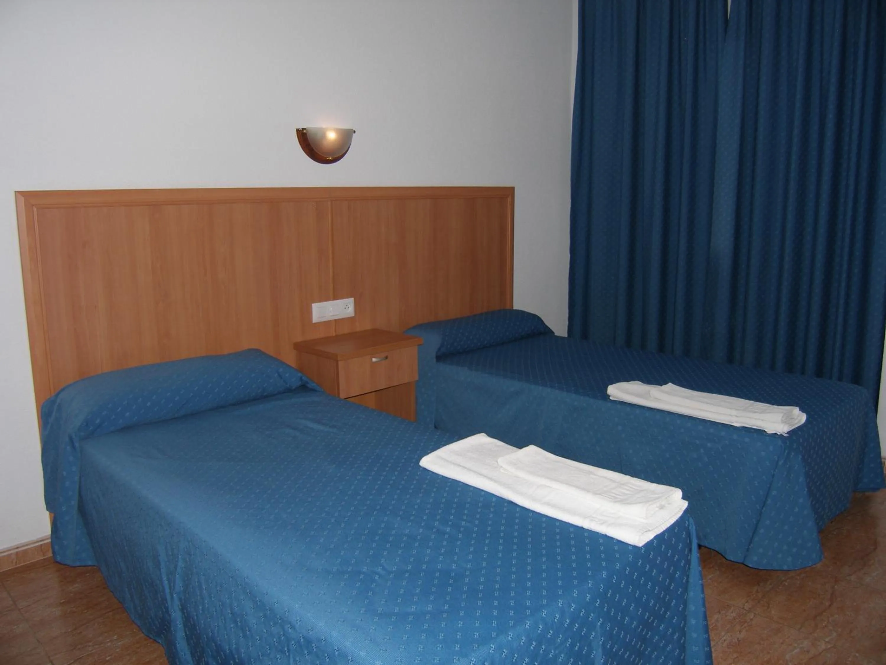 Bedroom, Bed in Apartamentos Maracay