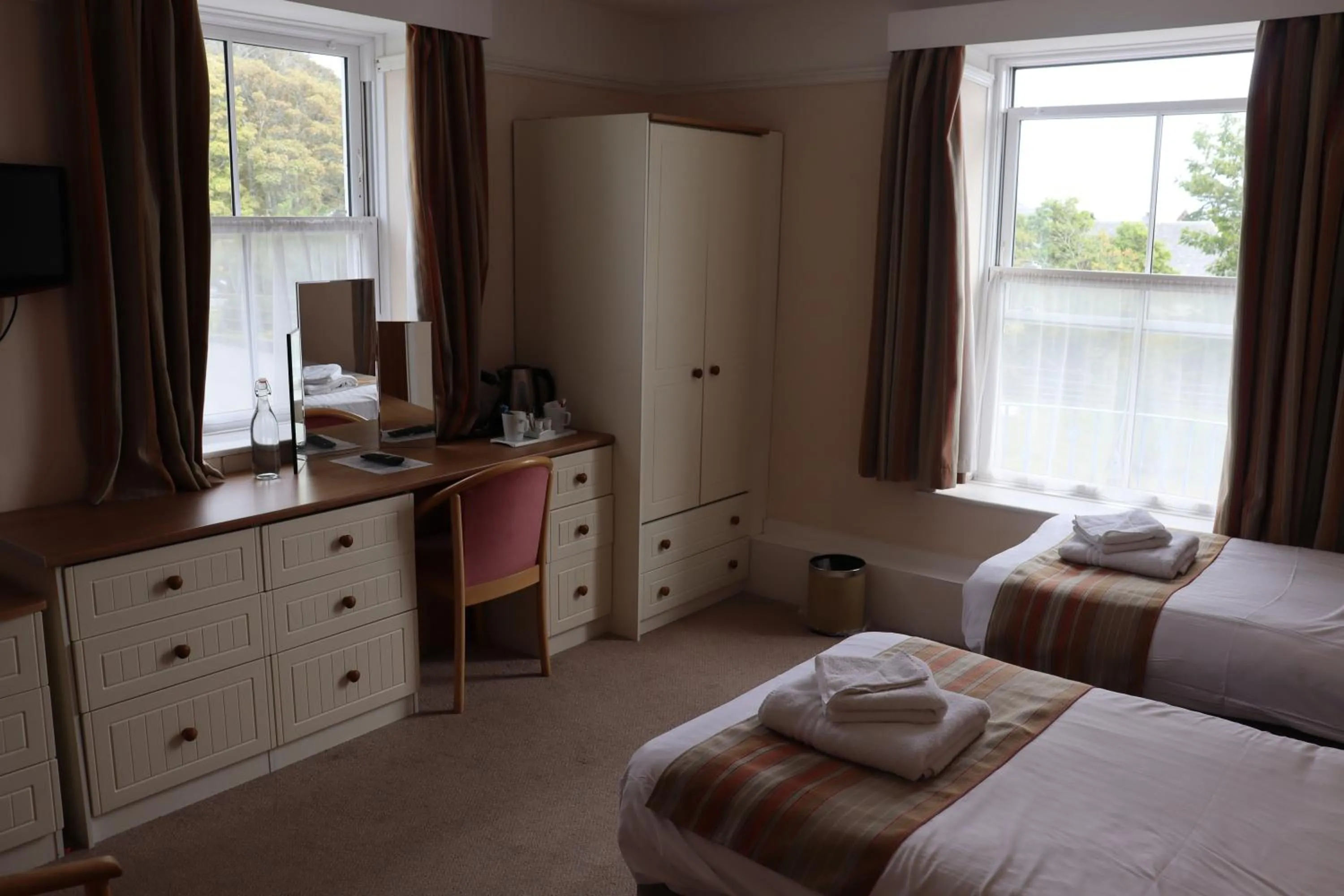 Bed in Lion Hotel & Studio Apartments