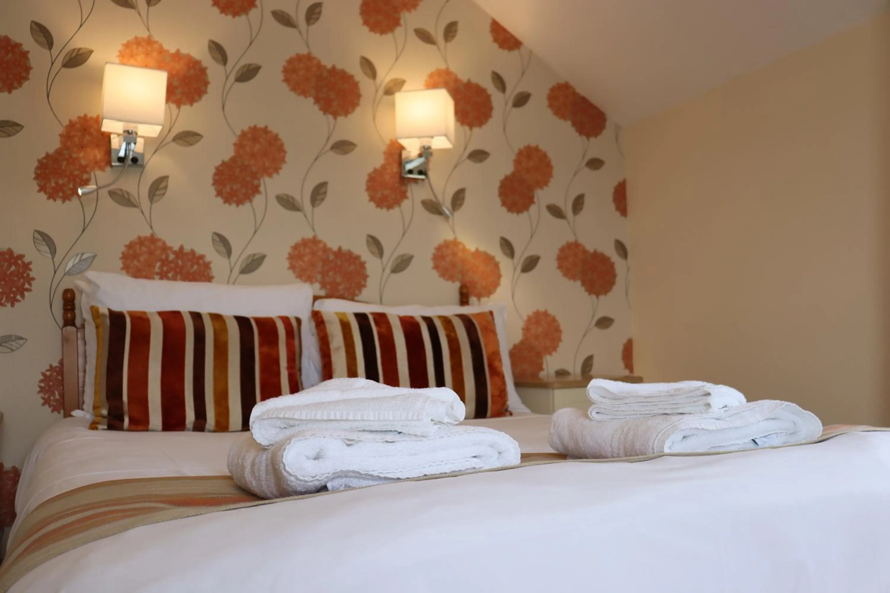 Bed in Lion Hotel & Studio Apartments