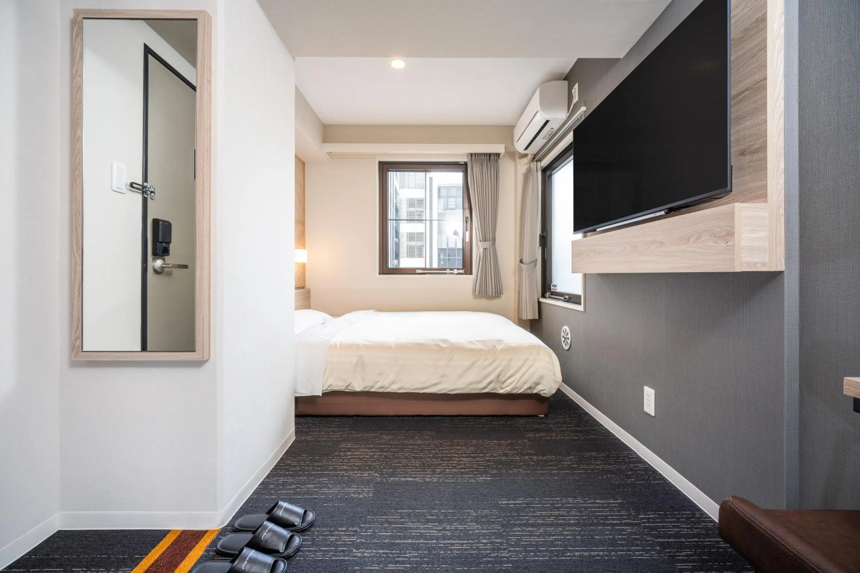 Bed in Super Hotel Kobe