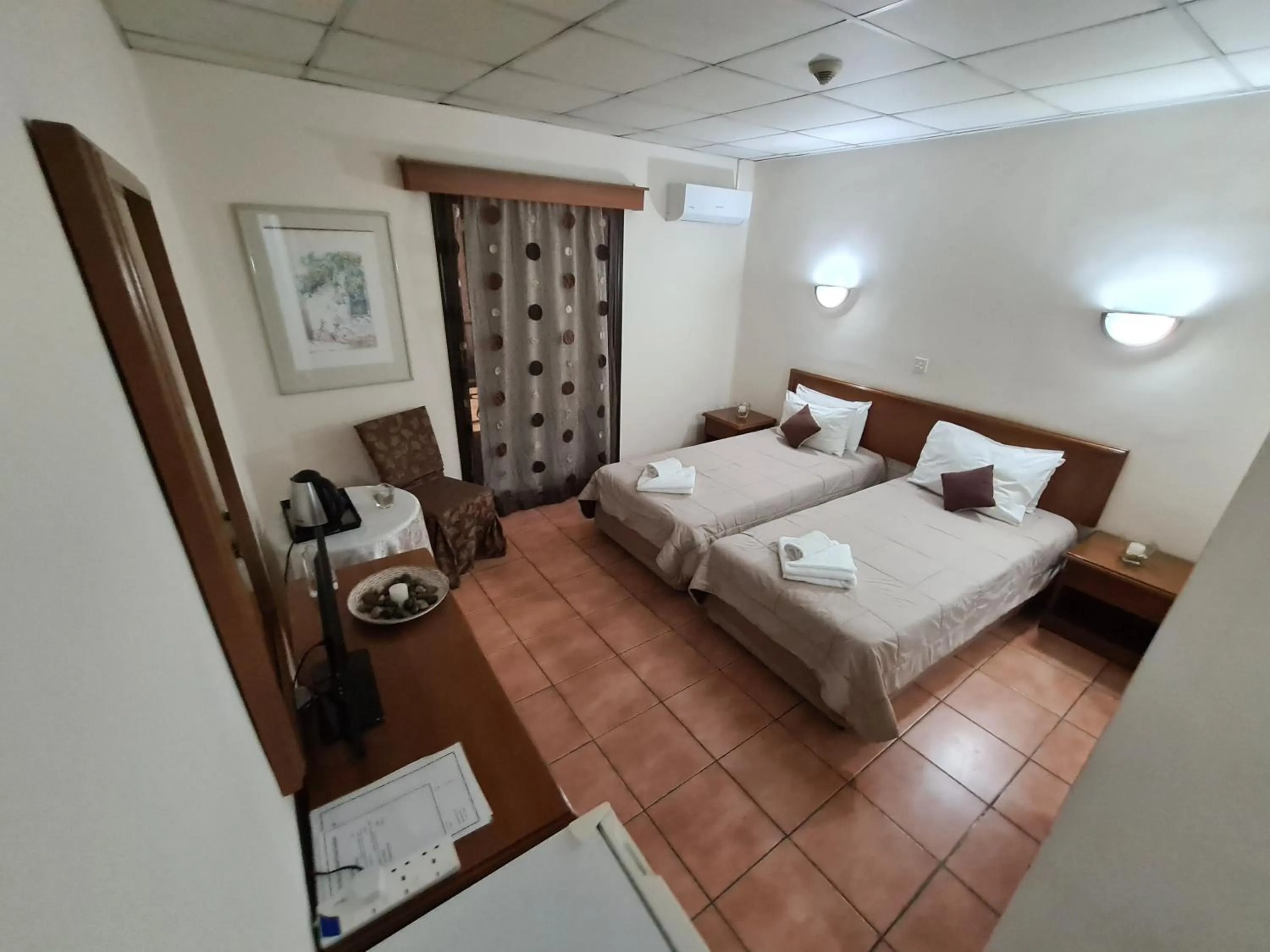 Bed in Metropole Hotel