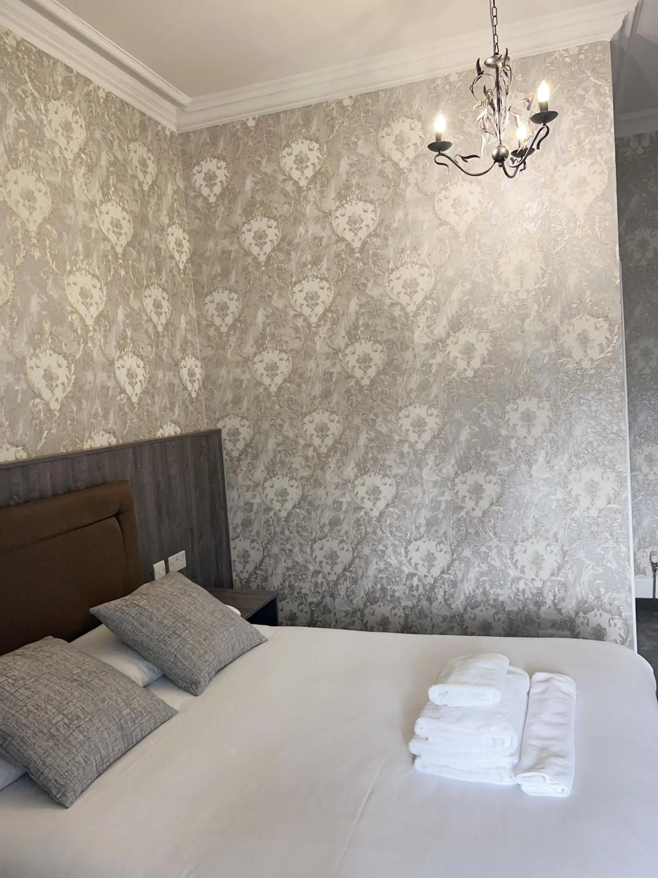 Bed in Alexander Guest House