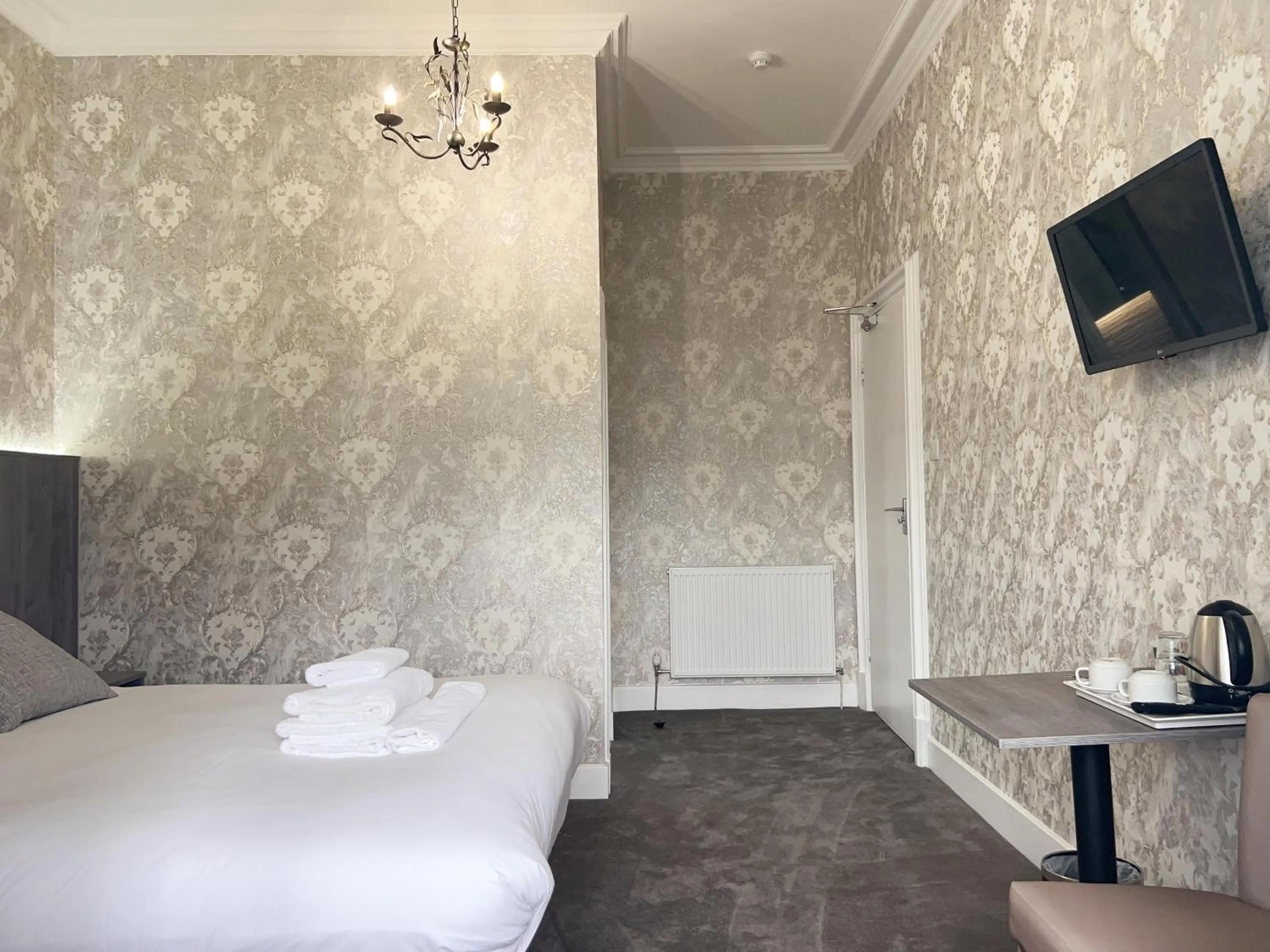 Bed in Alexander Guest House