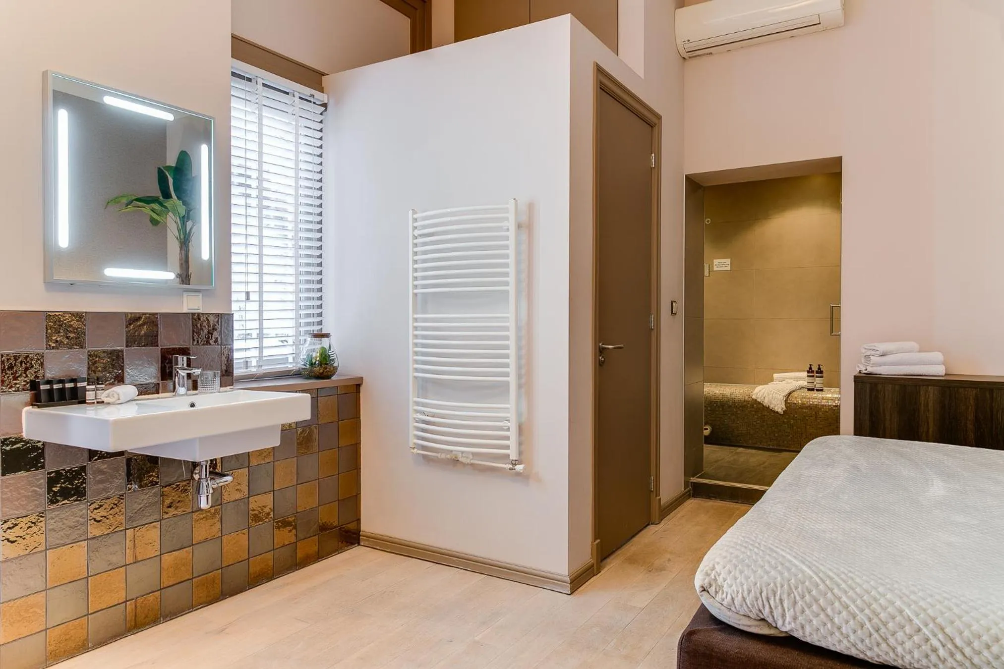 Photo of the whole room, Bed in Brasss Hotel Suites