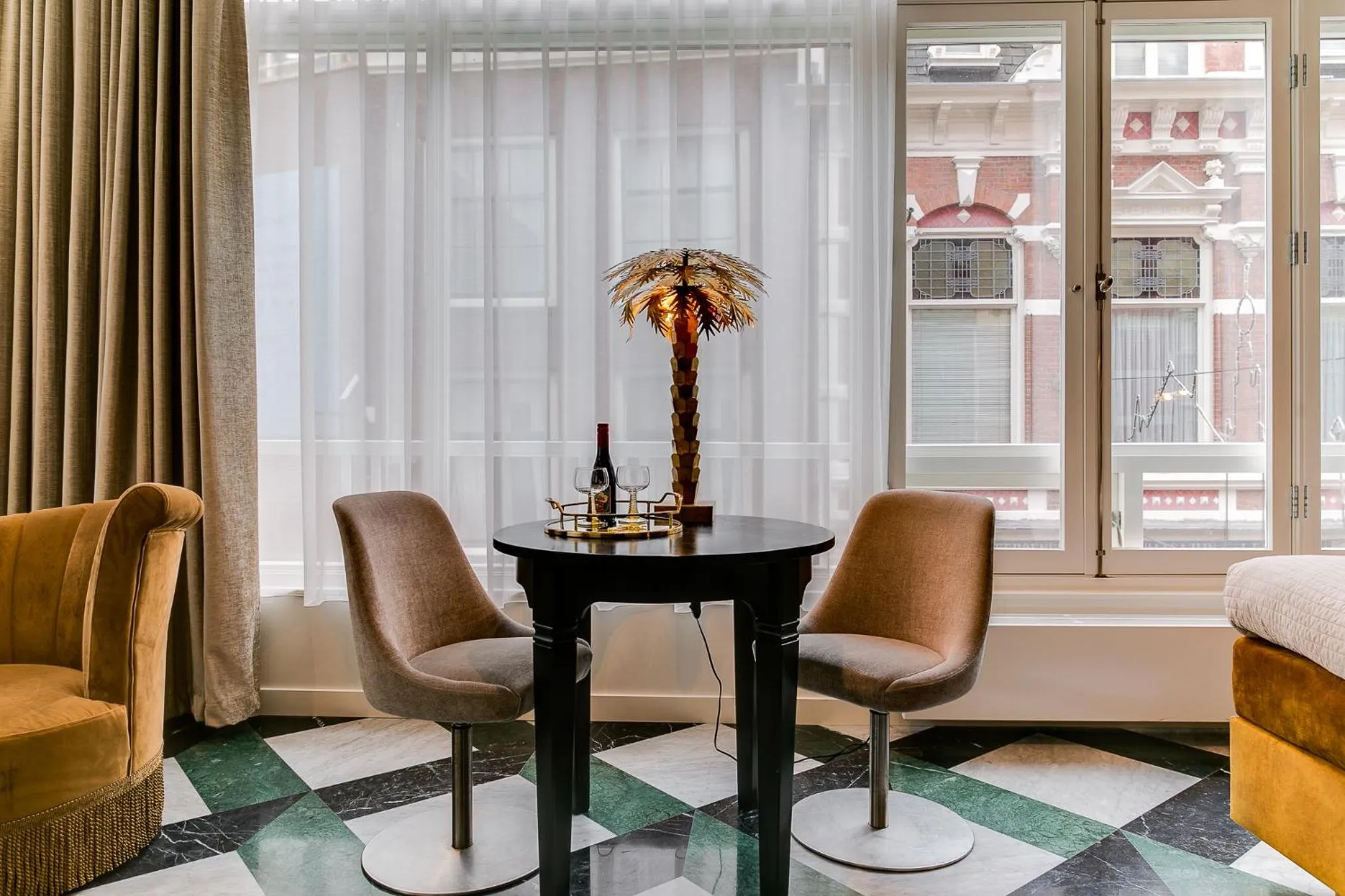 Seating area in Brasss Hotel Suites