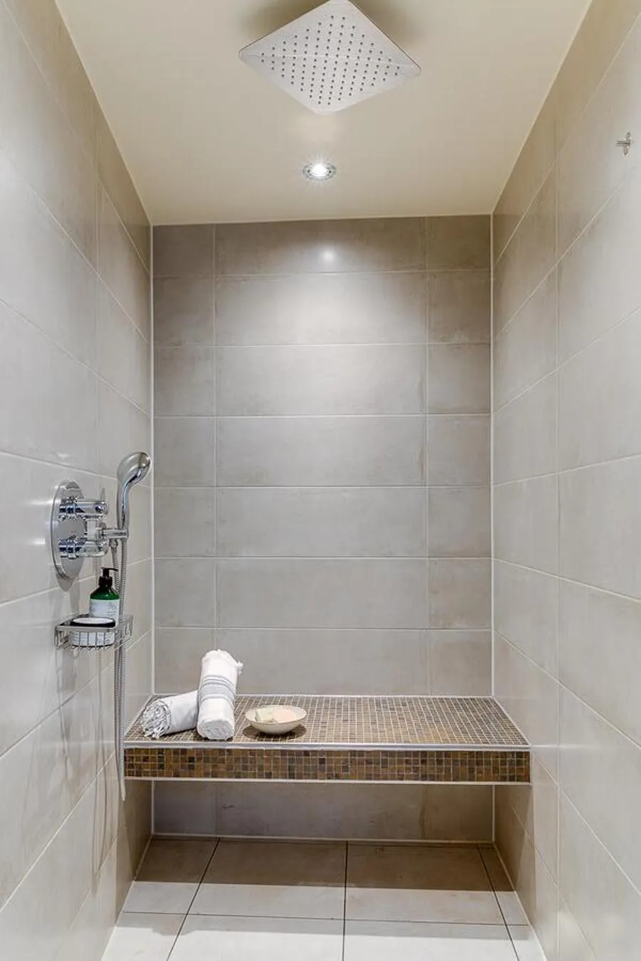 Steam room in Brasss Hotel Suites