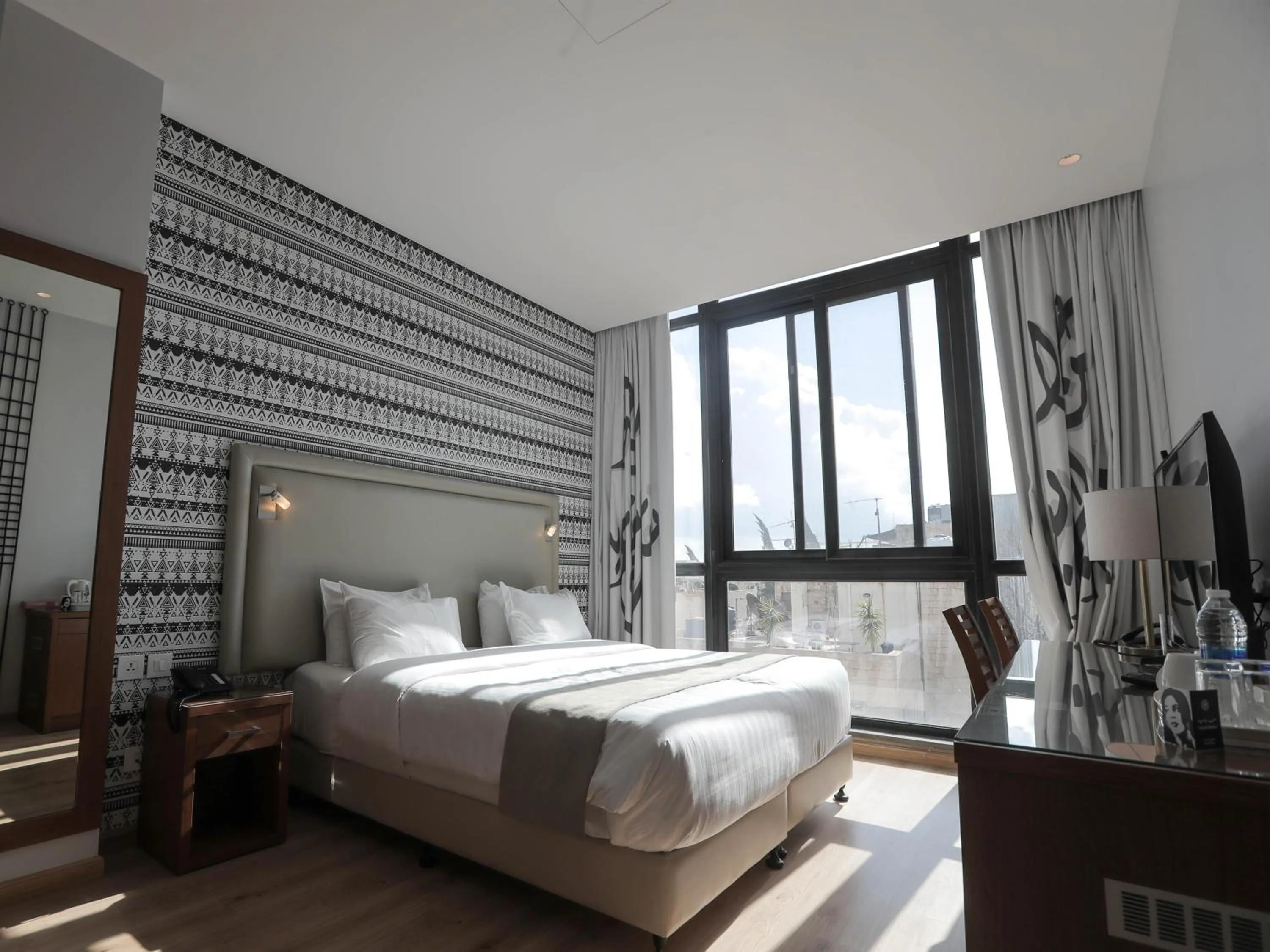 Bed in La Locanda Boutique Hotel