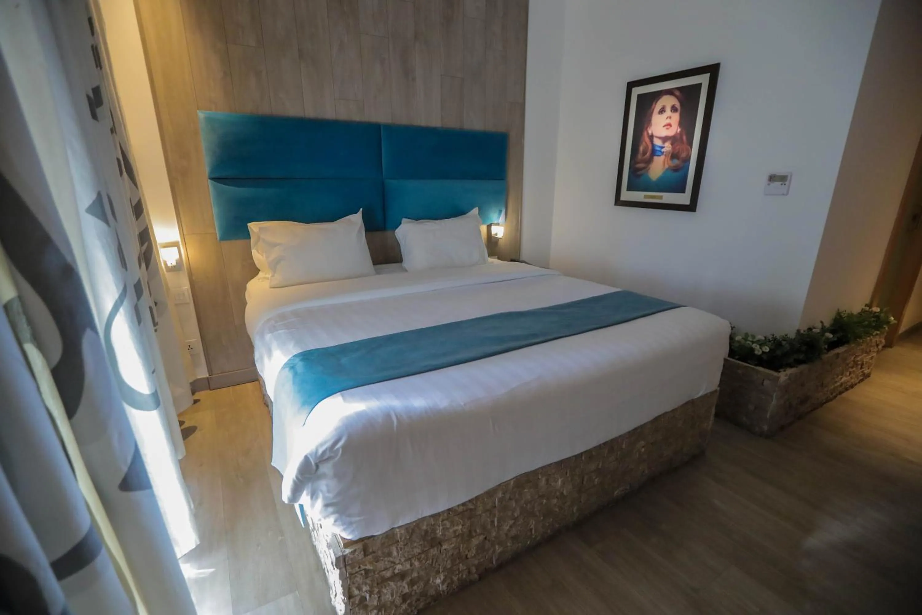 Bedroom, Bed in La Locanda Boutique Hotel