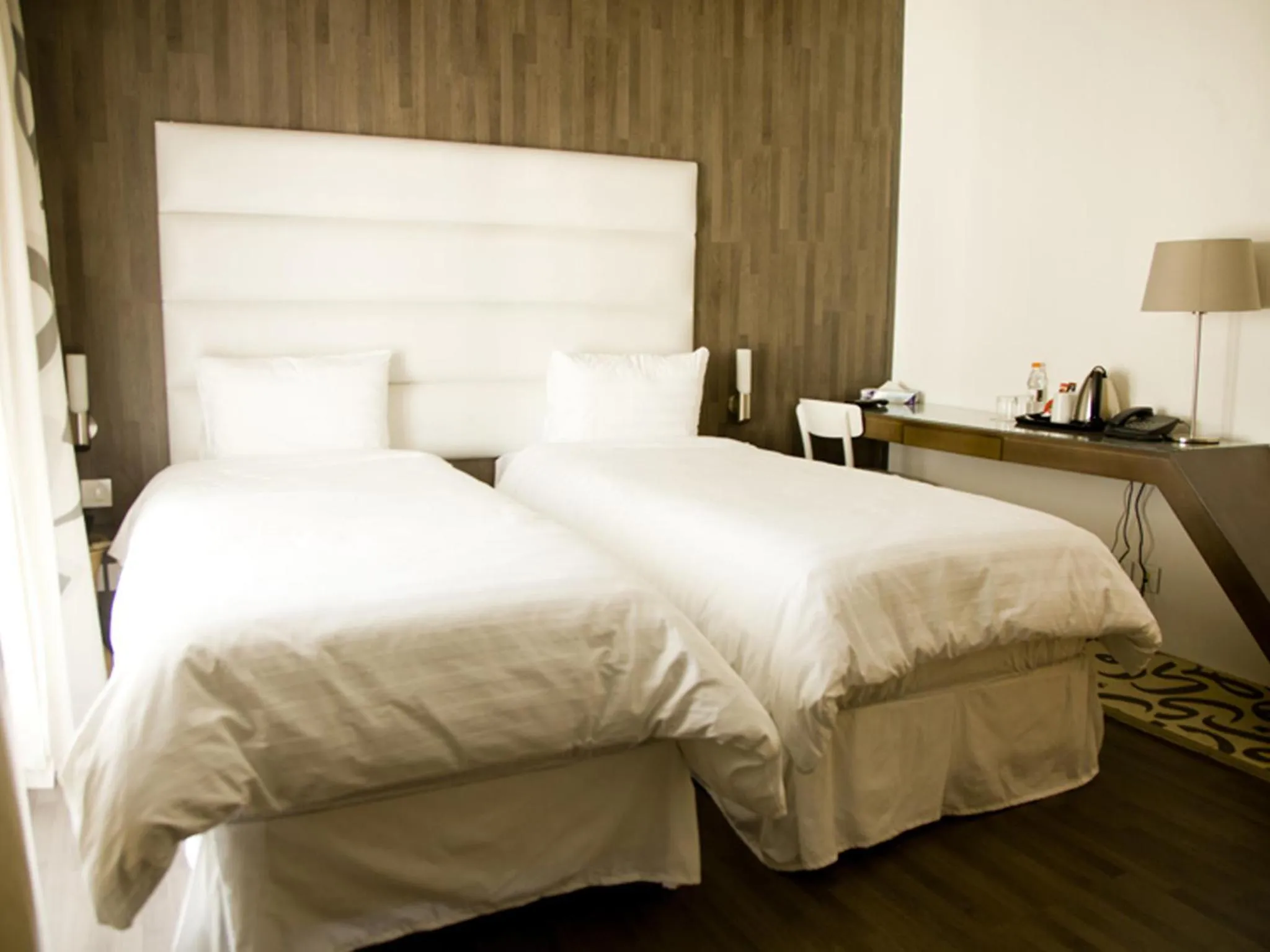 Bed in La Locanda Boutique Hotel