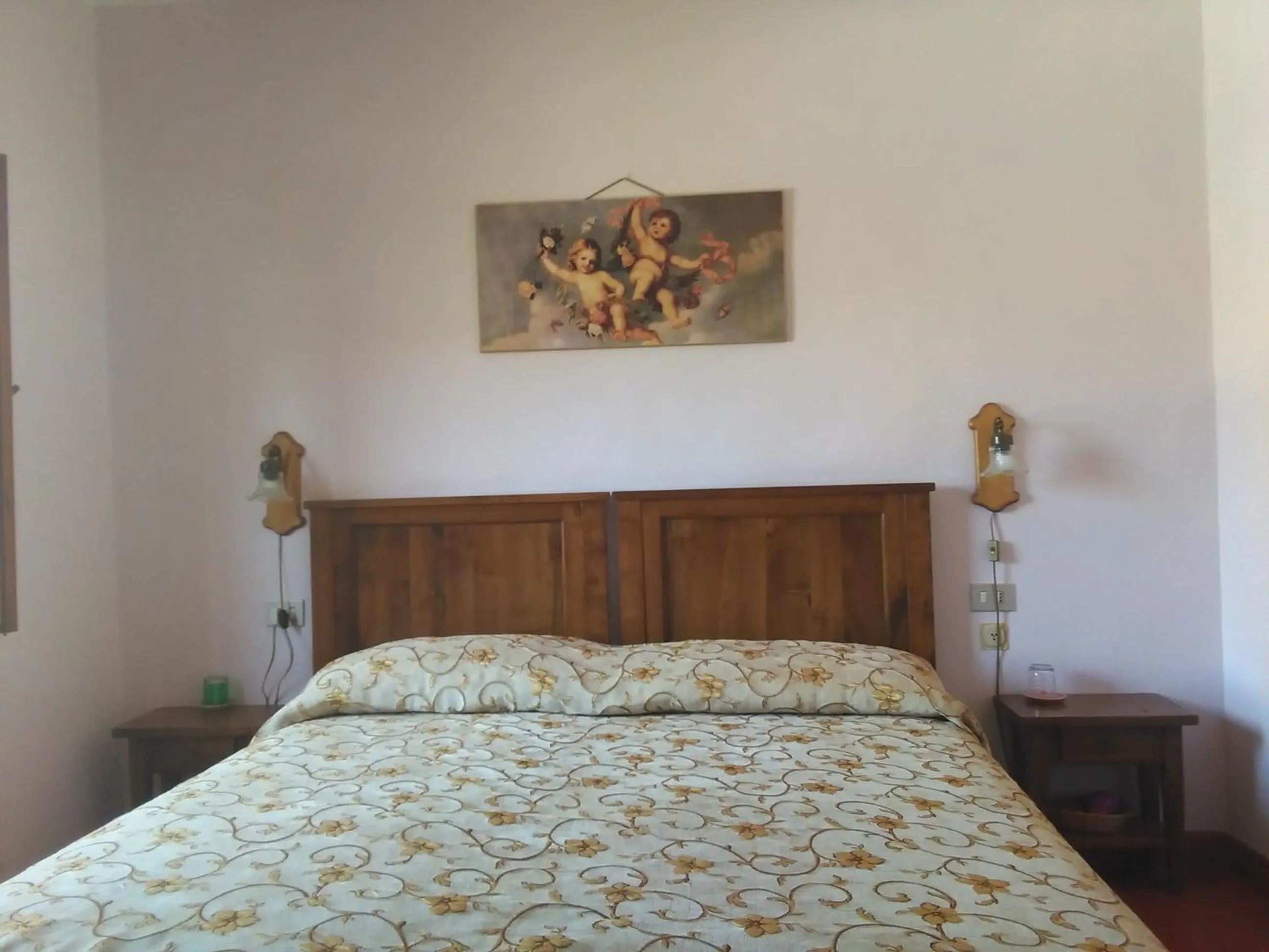 Bed in Albergo Villa Sorriso