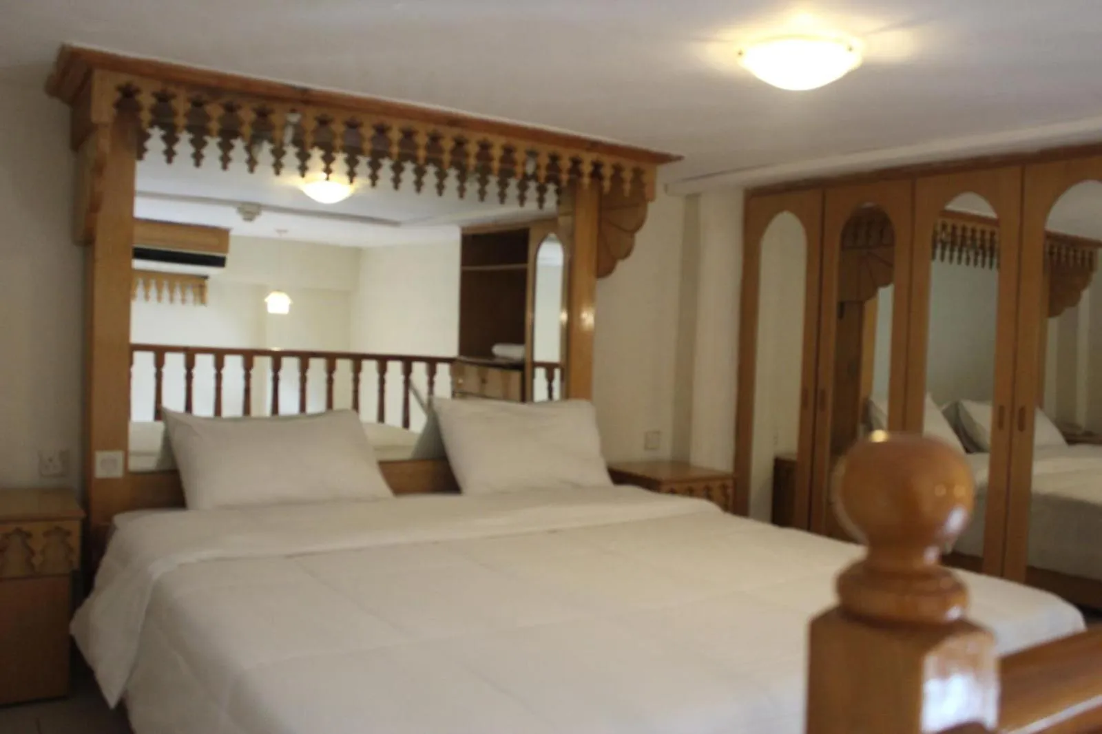 Bed in Kuwait Palace Hotel