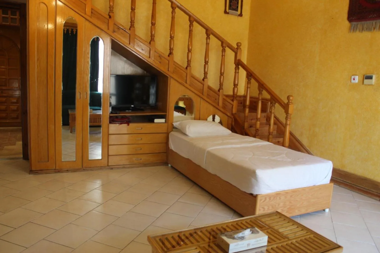 Bed in Kuwait Palace Hotel