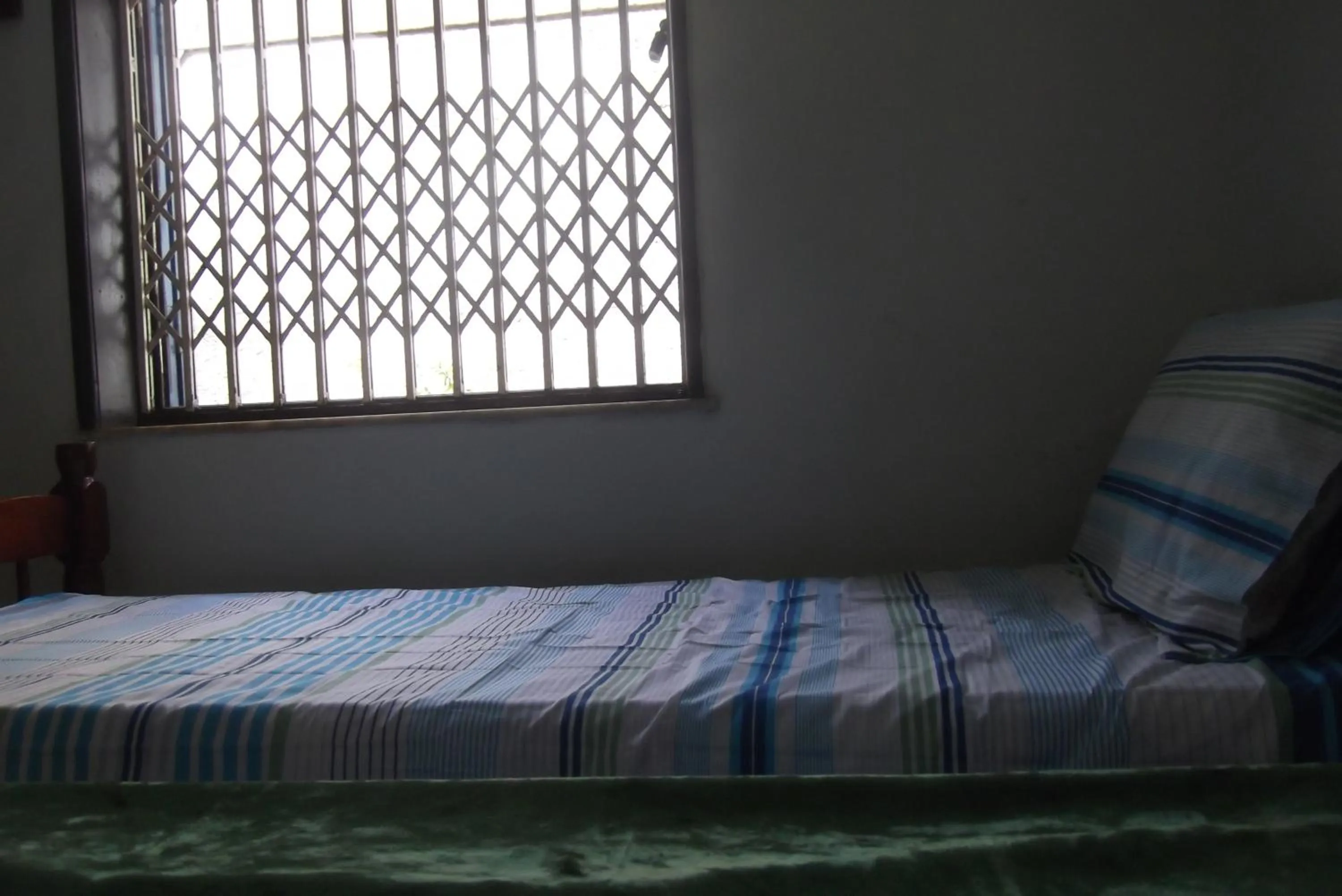 Bed in Tião Botelho Guest House