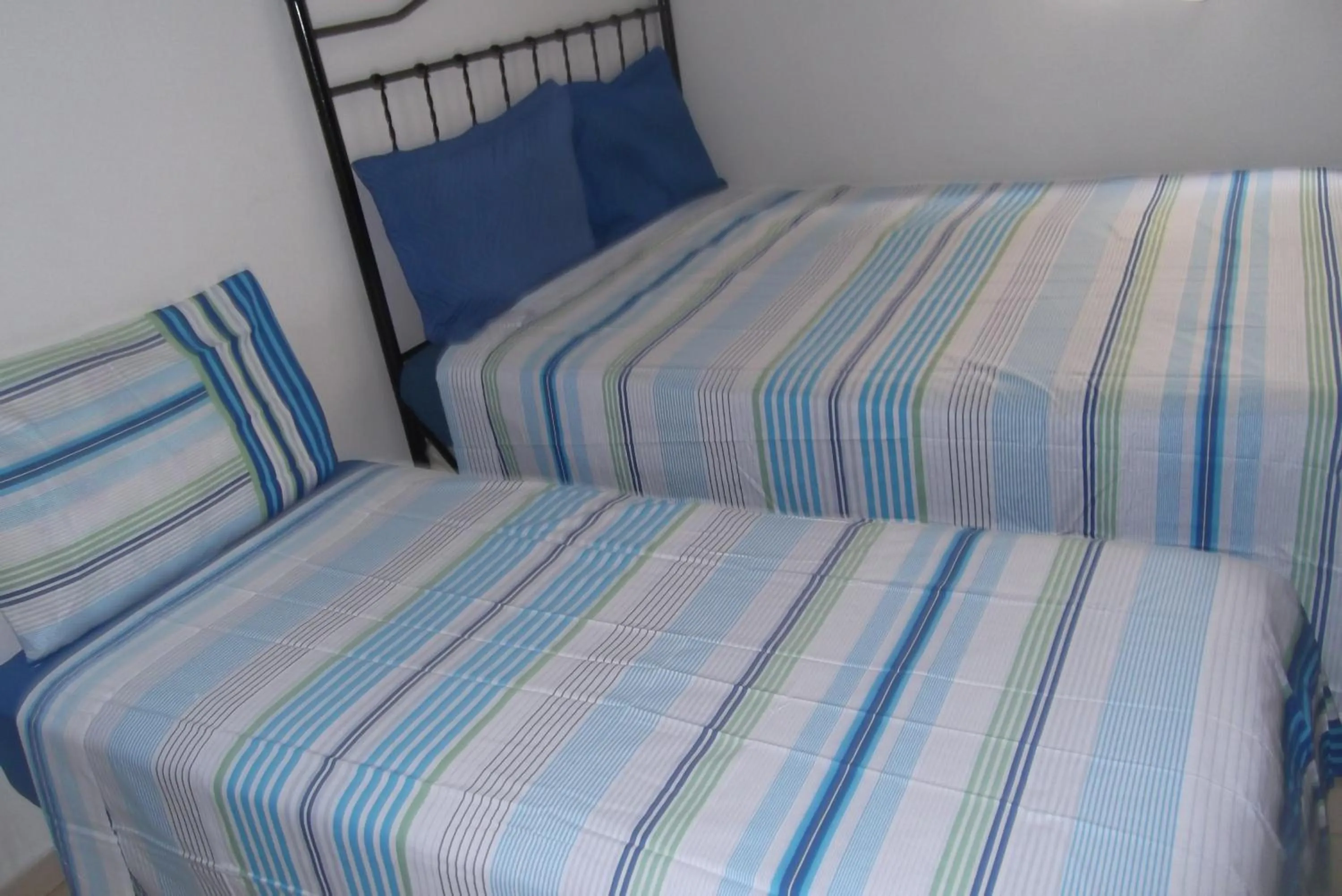 Bed in Tião Botelho Guest House