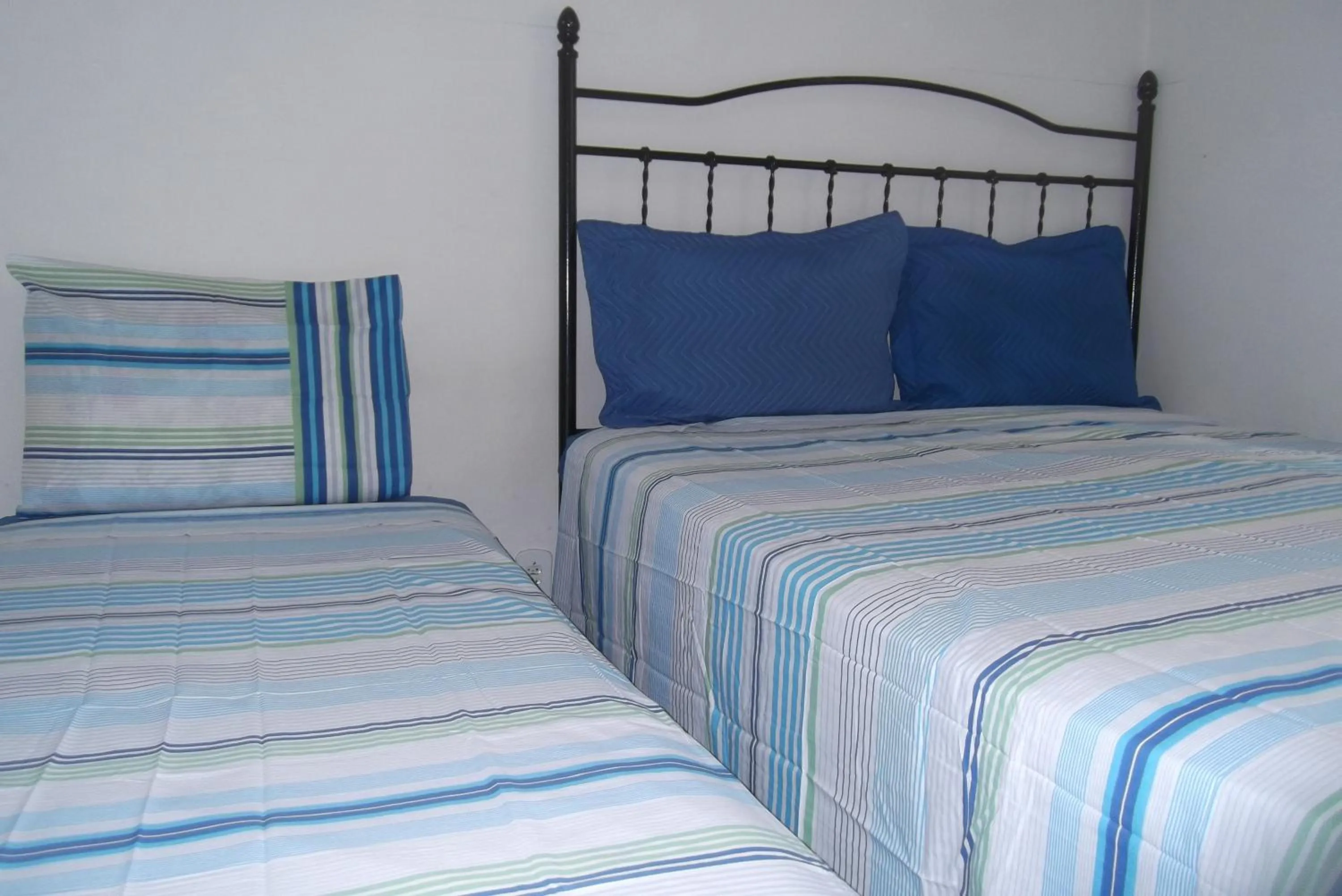 Bed in Tião Botelho Guest House