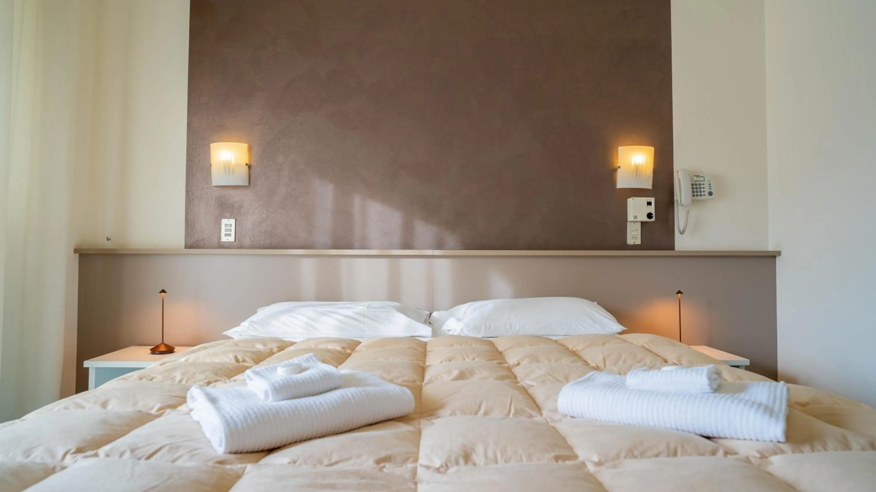 Bed in Hotel Sorriso