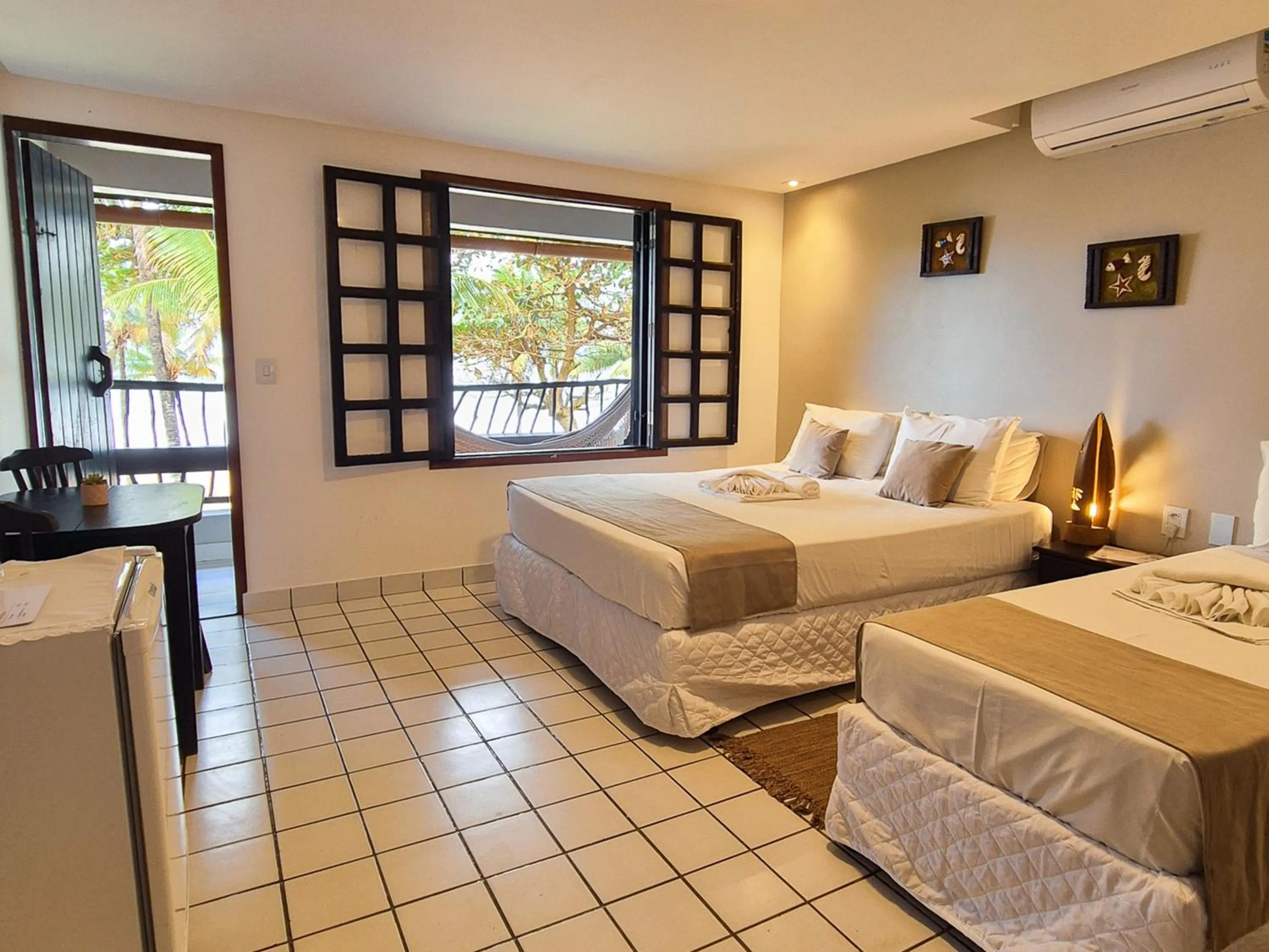 Bed in Pousada dos Coqueiros