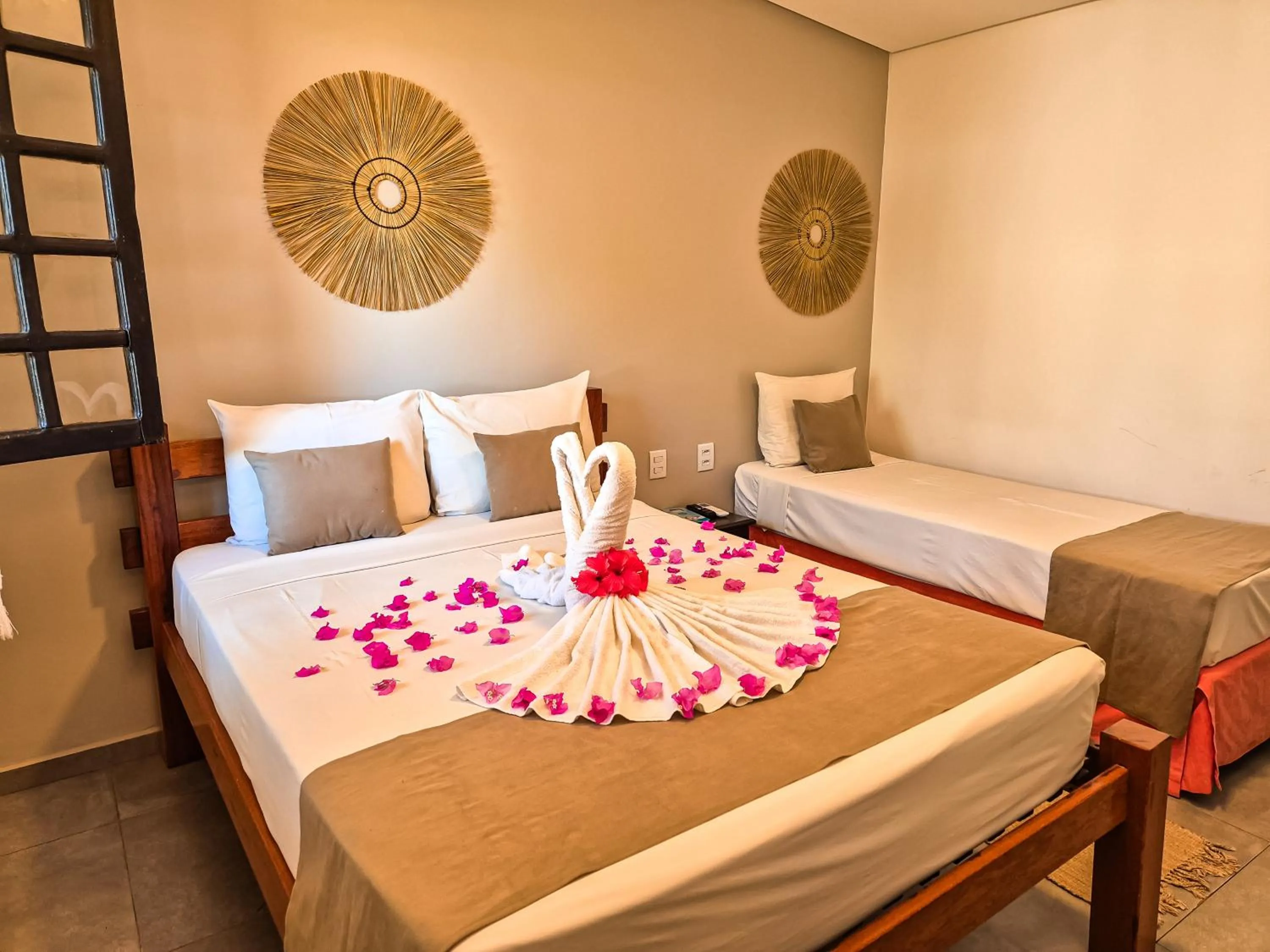 Bed in Pousada dos Coqueiros