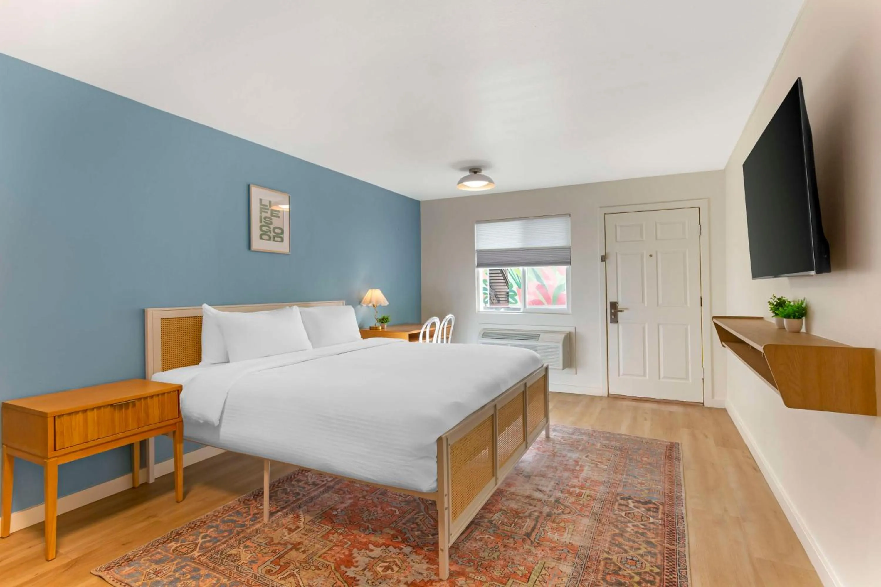 Bedroom, Bed in The Kennedy Tucson, SureStay Collection by Best Western