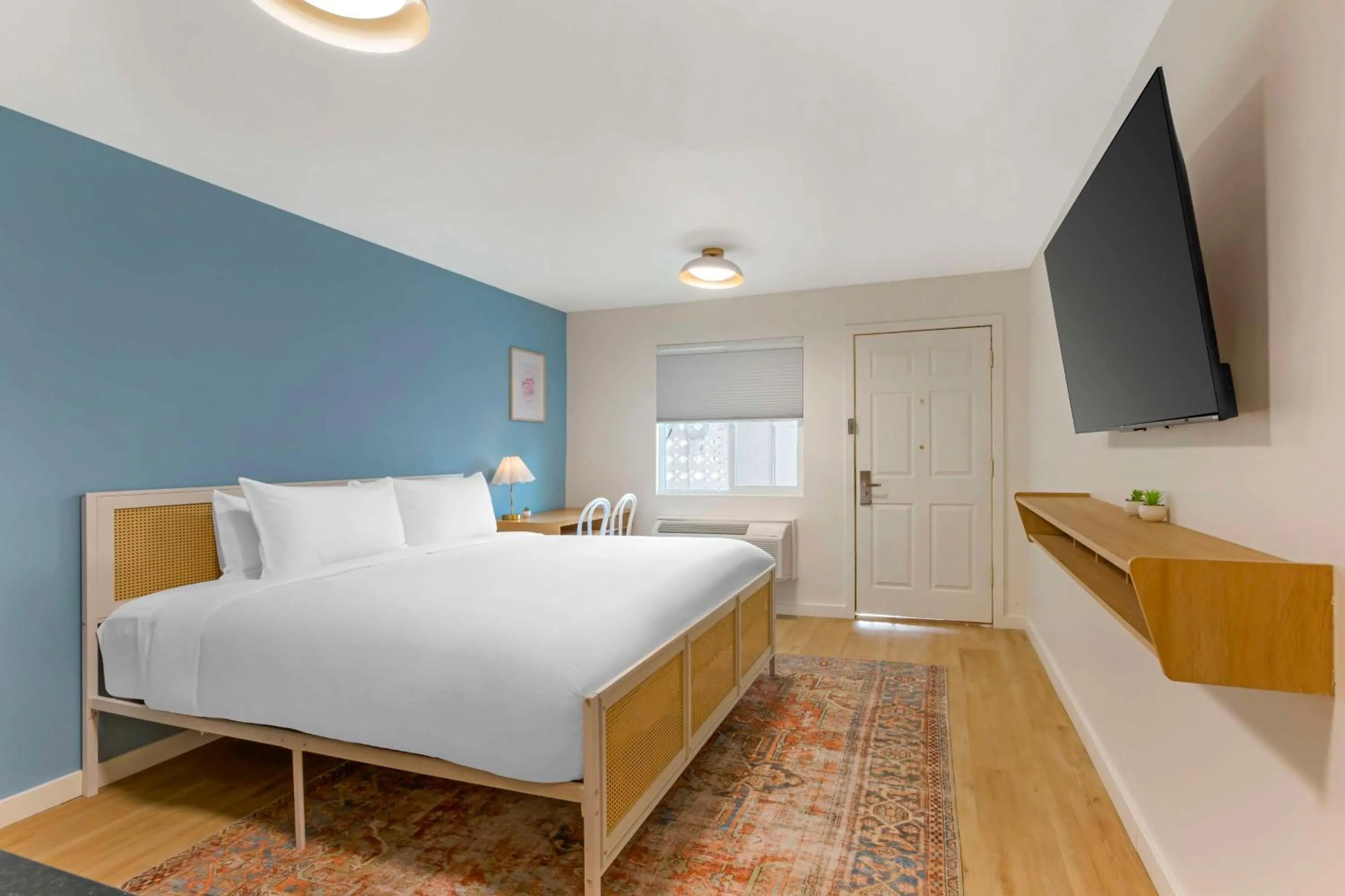 Bedroom, Bed in The Kennedy Tucson, SureStay Collection by Best Western