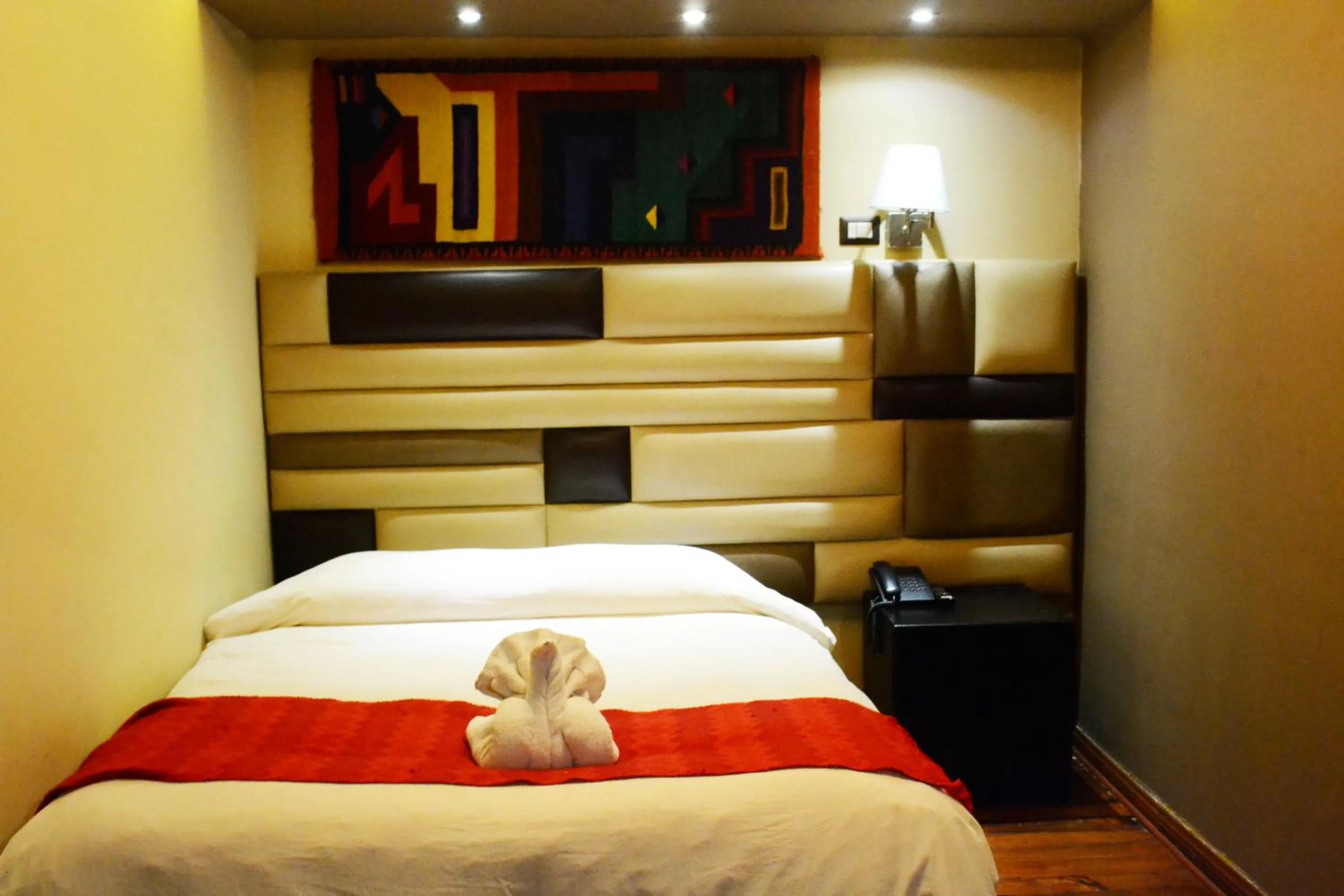 Bed in Hotel Royal Qosqo