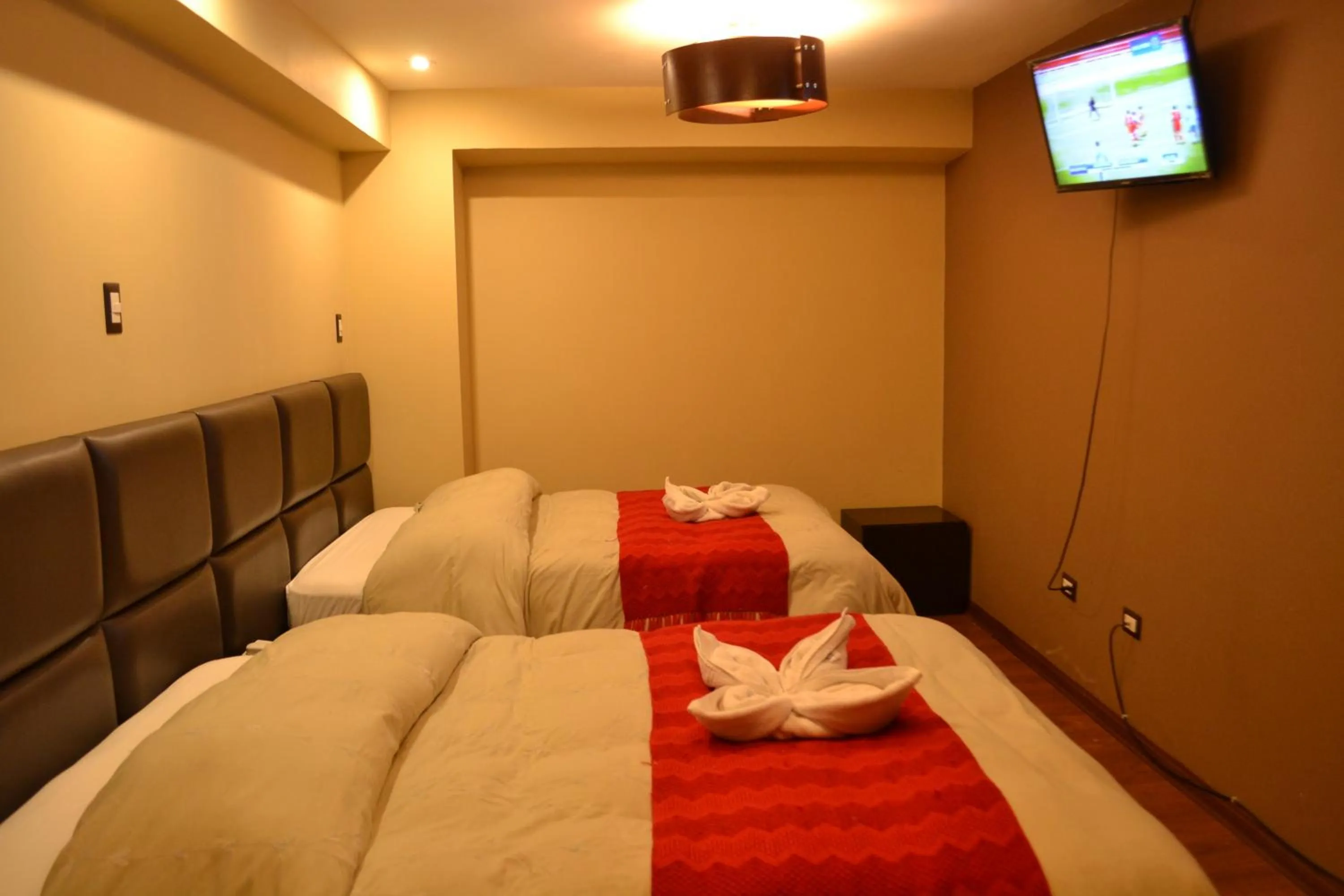 Bed in Hotel Royal Qosqo