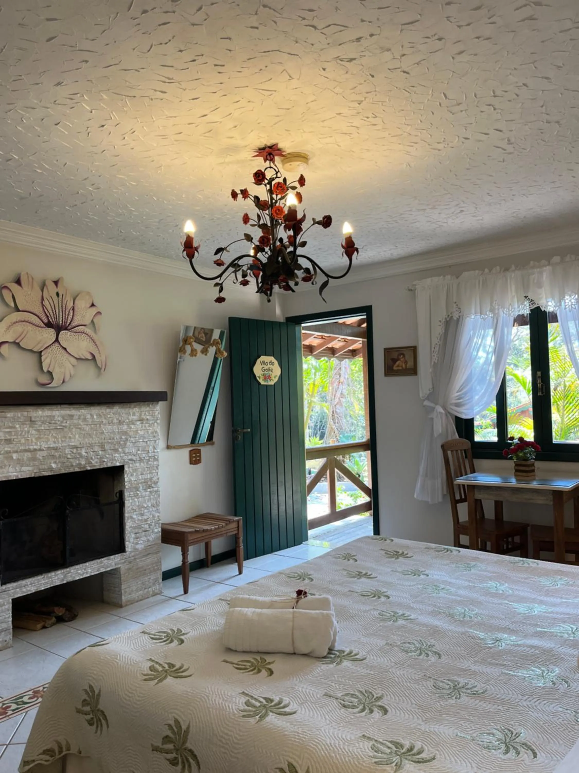 fireplace, Bed in Urikana Boutique Hotel